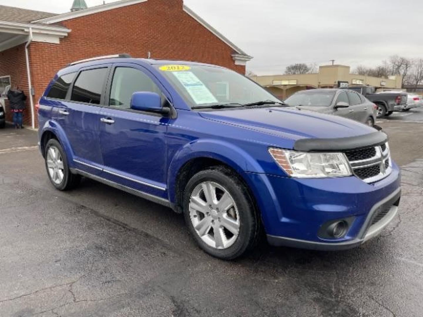 2012 Blue Pearl Coat Dodge Journey Crew (3C4PDCDG0CT) with an 3.6L V6 DOHC 24V engine, 6-Speed Automatic transmission, located at 1099 N County Rd 25A , Troy, OH, 45373, (937) 908-9800, 40.057079, -84.212883 - Photo#0