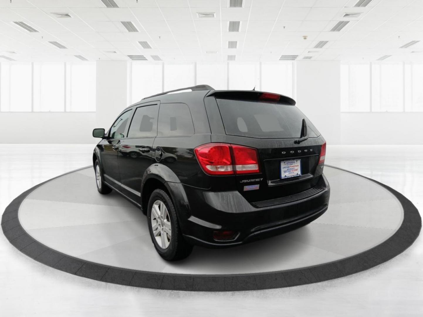 2012 Brilliant Black Crystal Pearl Dodge Journey SXT (3C4PDCBB6CT) with an 2.4L L6 DOHC 16V engine, 4-Speed Automatic transmission, located at 8750 N County Rd 25A, Piqua, OH, 45356, (937) 908-9800, 40.164391, -84.232513 - Photo#4