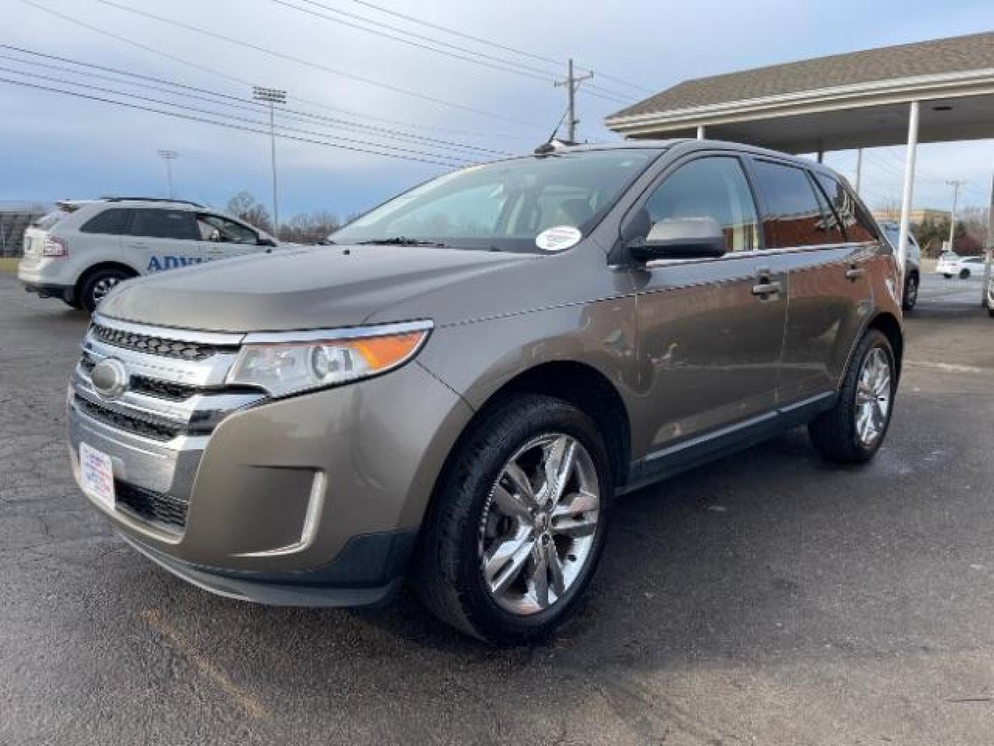 2012 Mineral Gray Metallic Ford Edge Limited AWD (2FMDK4KC7CB) with an 3.5L V6 DOHC 24V engine, 6-Speed Automatic transmission, located at 1951 S Dayton Lakeview Rd., New Carlisle, OH, 45344, (937) 908-9800, 39.890999, -84.050255 - Photo#1