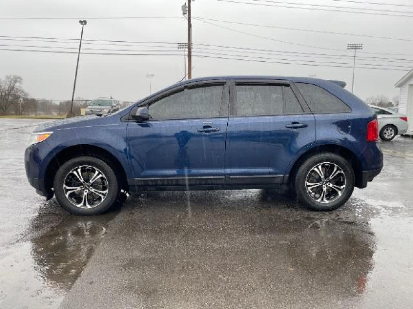 2012 Dark Blue Pearl Metallic Ford Edge SEL FWD (2FMDK3JC7CB) with an 3.5L V6 DOHC 24V engine, 6-Speed Automatic transmission, located at 401 Woodman Dr, Riverside, OH, 45431, (937) 908-9800, 39.760899, -84.123421 - Photo#2