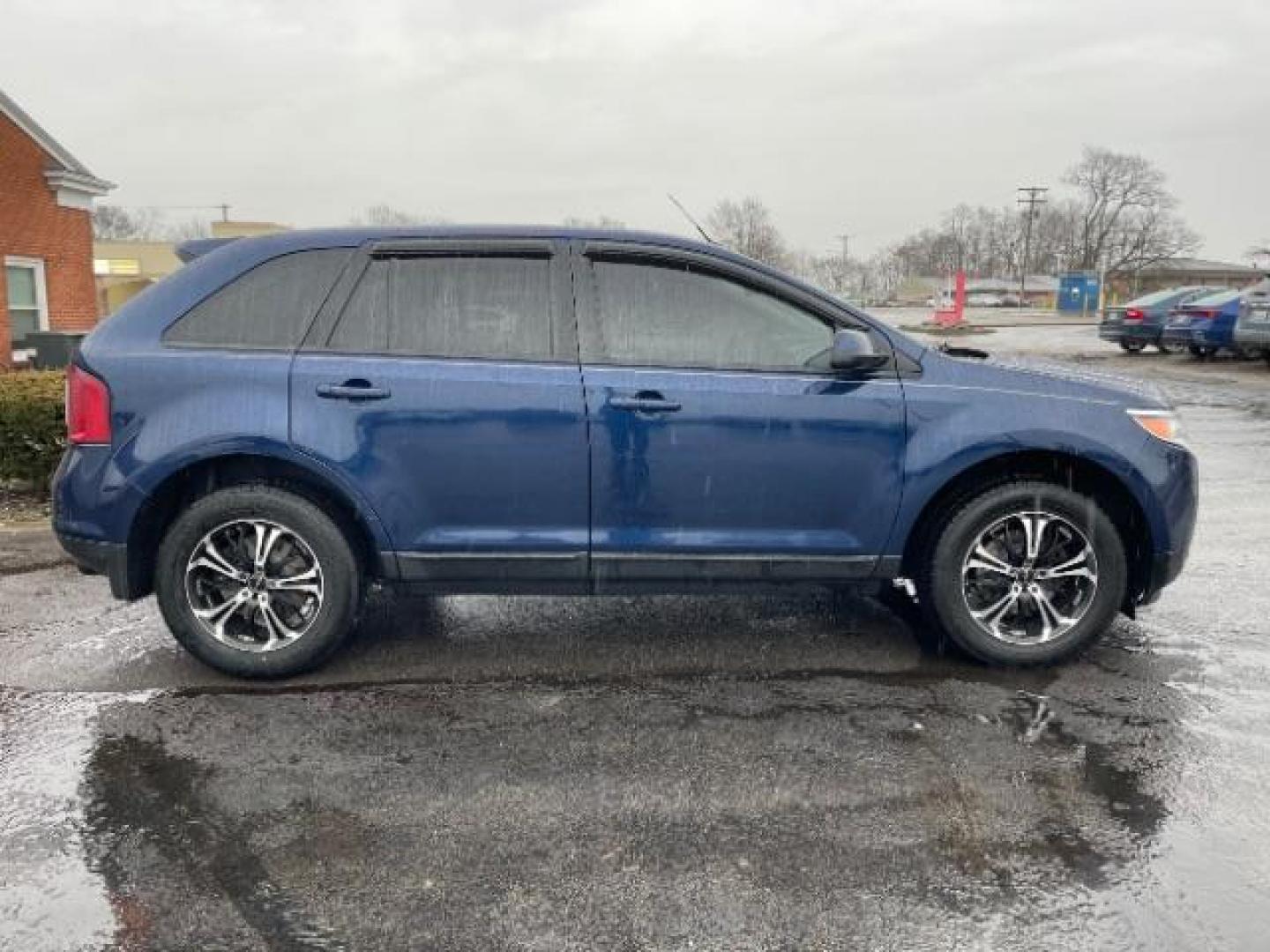 2012 Dark Blue Pearl Metallic Ford Edge SEL FWD (2FMDK3JC7CB) with an 3.5L V6 DOHC 24V engine, 6-Speed Automatic transmission, located at 401 Woodman Dr, Riverside, OH, 45431, (937) 908-9800, 39.760899, -84.123421 - Photo#3