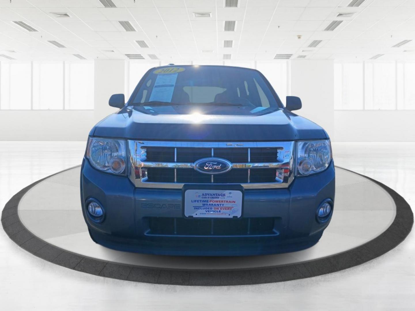 2012 Blue Flame Metallic Ford Escape XLT FWD (1FMCU0DG1CK) with an 3.0L V6 DOHC 24V engine, 6-Speed Automatic transmission, located at 1184 Kauffman Ave, Fairborn, OH, 45324, (937) 908-9800, 39.807072, -84.030914 - Photo#6