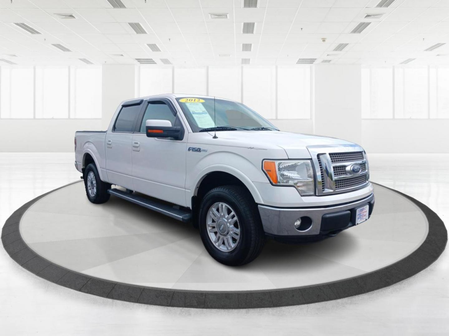 2012 White Platinum Metallic Tricoat Ford F-150 Lariat SuperCrew 5.5-ft. Bed 4WD (1FTFW1EFXCF) with an 5.0L V8 engine, 6-Speed Automatic transmission, located at 880 E. National Road, Vandalia, OH, 45377, (937) 908-9800, 39.891918, -84.183594 - Photo#0