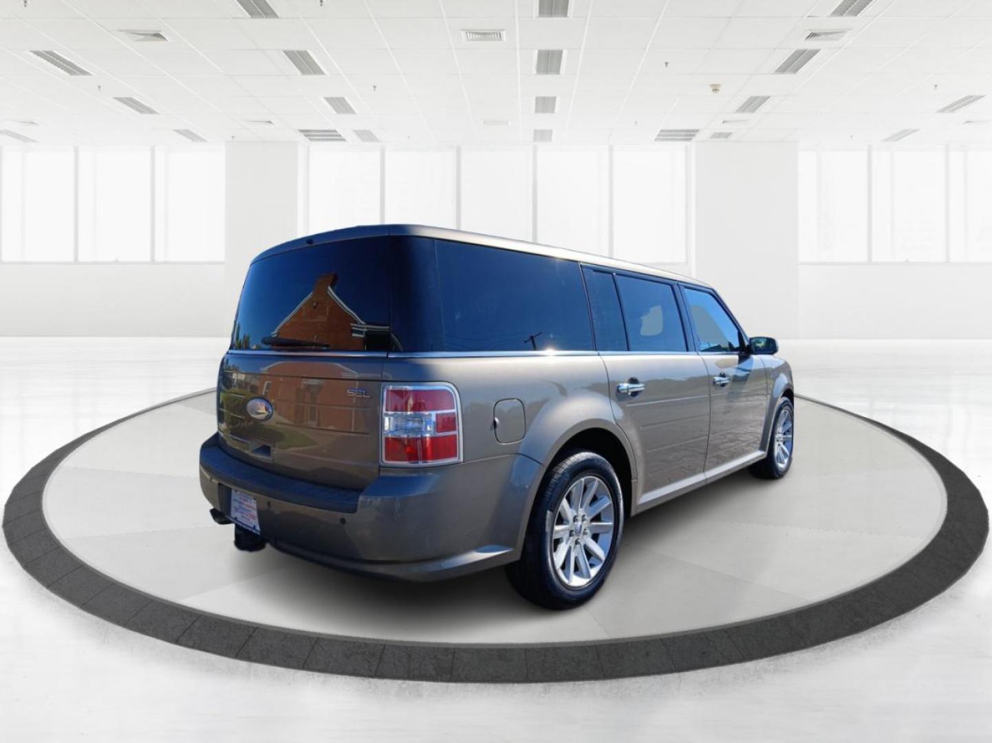 2012 Ford Flex SEL FWD (2FMGK5CC2CB) with an 3.5L V6 DOHC 24V engine, 6-Speed Automatic Overdrive transmission, located at 1184 Kauffman Ave, Fairborn, OH, 45324, (937) 908-9800, 39.807072, -84.030914 - Third Row - Photo#2