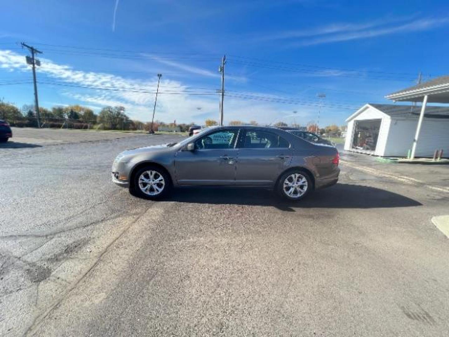 2012 Sterling Gray Metallic Ford Fusion SE (3FAHP0HA5CR) with an 2.5L L4 DOHC 16V engine, located at 4508 South Dixie Dr, Moraine, OH, 45439, (937) 908-9800, 39.689976, -84.218452 - Photo#3