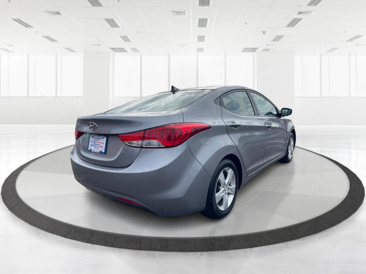 2012 Harbor Gray Metallic Hyundai Elantra GLS A/T (KMHDH4AE3CU) with an 1.8L L4 DOHC 16V engine, 6-Speed Automatic transmission, located at 8750 N County Rd 25A, Piqua, OH, 45356, (937) 908-9800, 40.164391, -84.232513 - Photo#2