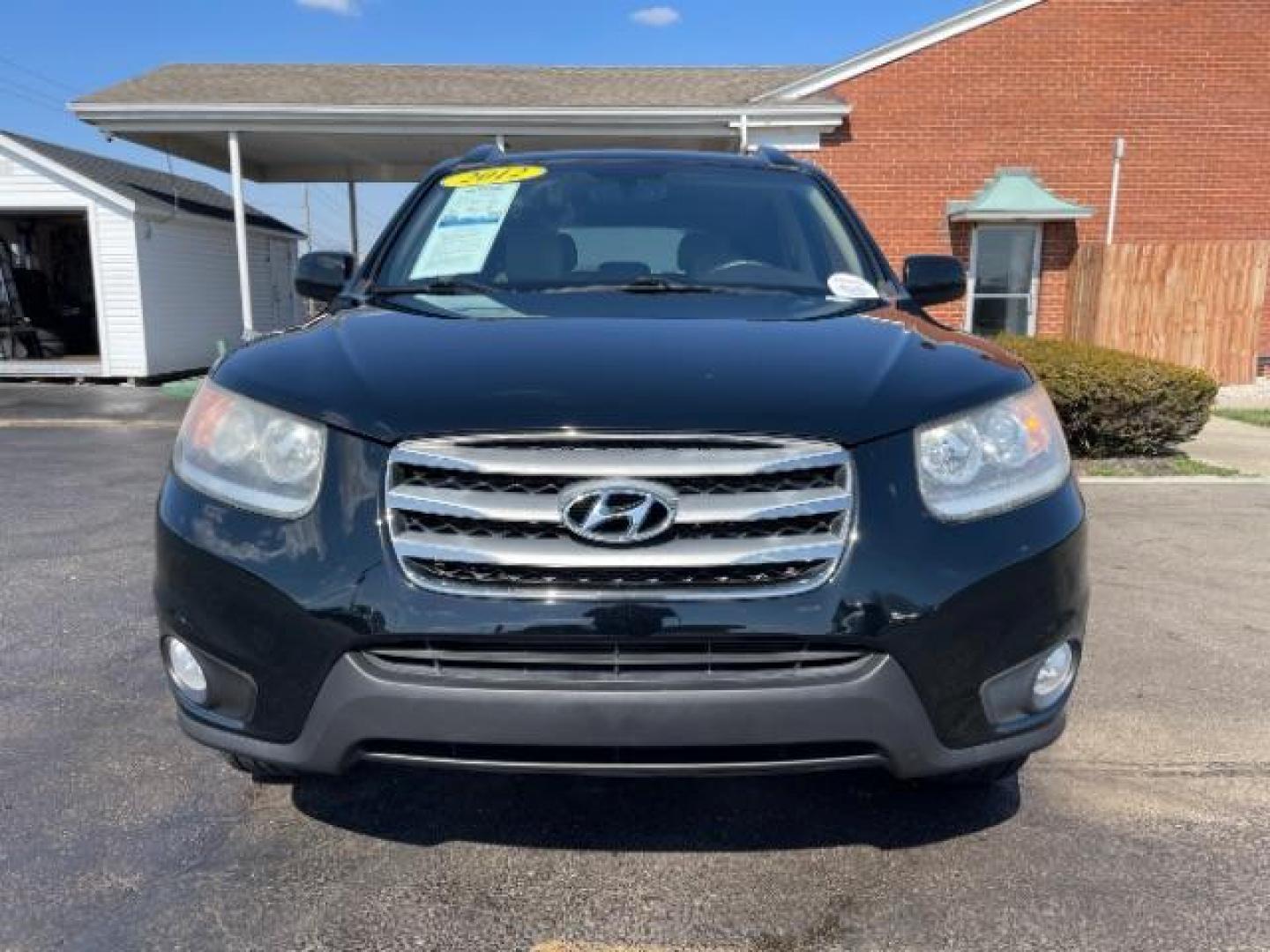 2012 Twilight Black Hyundai Santa Fe Limited 2.4 FWD (5XYZK3AB2CG) with an 2.4L L4 DOHC 16V engine, 6-Speed Automatic transmission, located at 880 E. National Road, Vandalia, OH, 45377, (937) 908-9800, 39.891918, -84.183594 - Photo#4