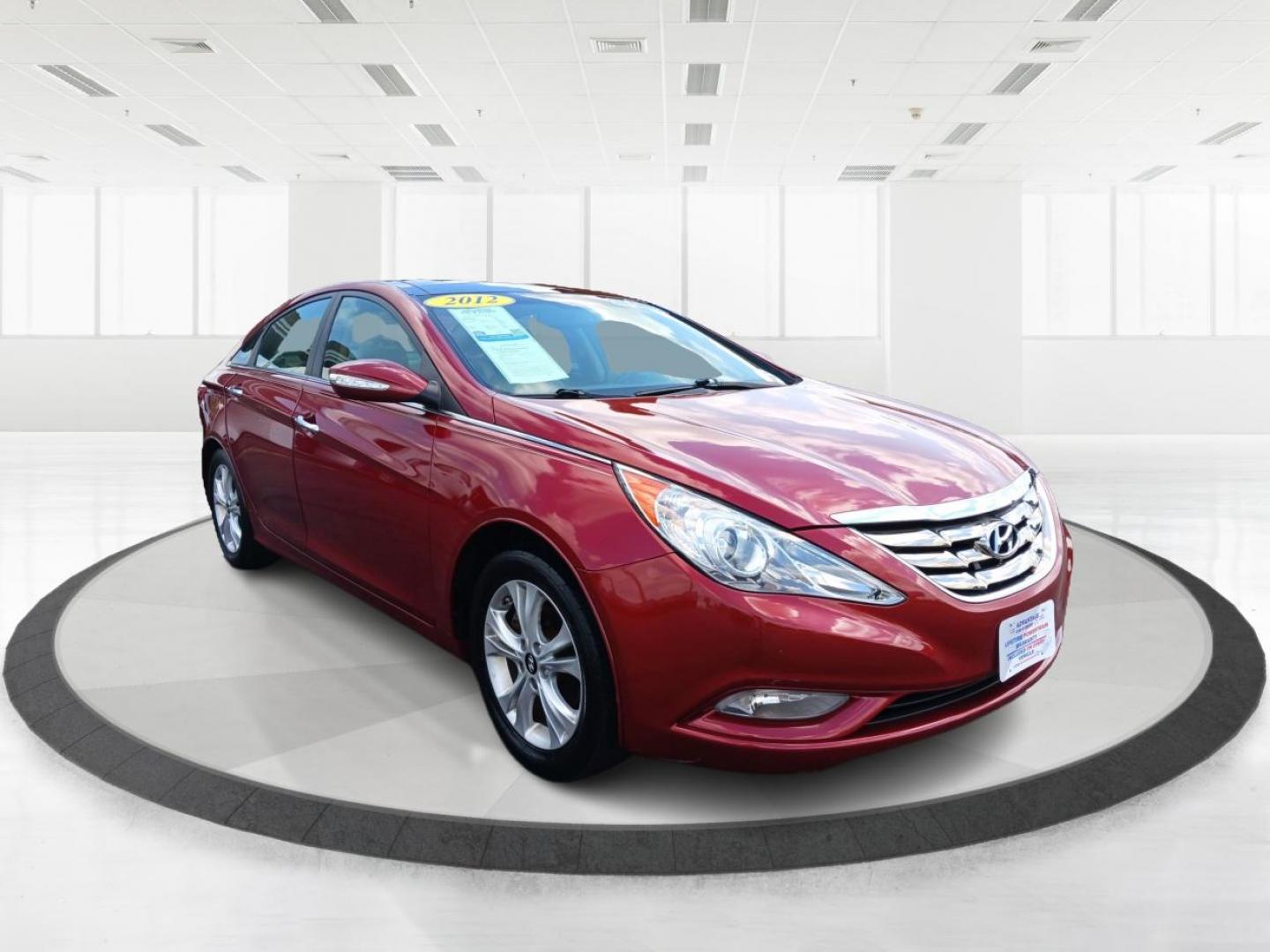 2012 Sparkling Ruby Hyundai Sonata Limited Auto (5NPEC4AC6CH) with an 2.4L L4 DOHC 16V engine, 6-Speed Automatic transmission, located at 880 E. National Road, Vandalia, OH, 45377, (937) 908-9800, 39.891918, -84.183594 - Photo#0