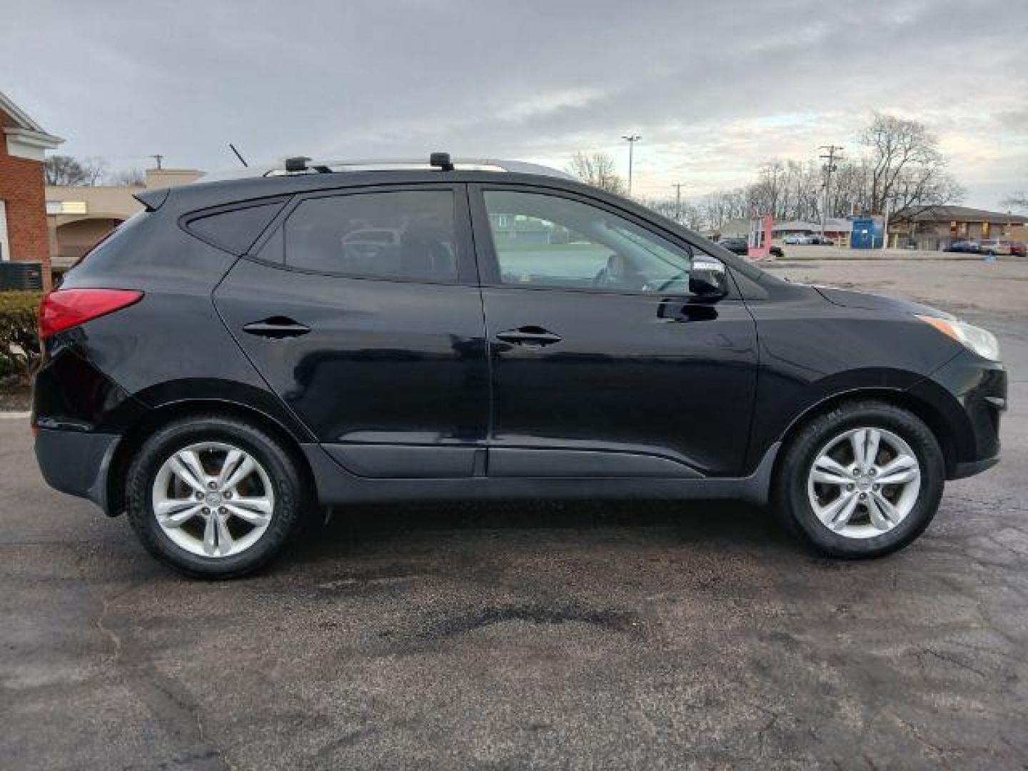 2012 Hyundai Tucson GLS AWD (KM8JUCACXCU) with an 2.4L L4 DOHC 16V engine, 6-Speed Automatic transmission, located at 1951 S Dayton Lakeview Rd., New Carlisle, OH, 45344, (937) 908-9800, 39.890999, -84.050255 - 2012 Hyundai Tucson GLS AWD - Photo#16