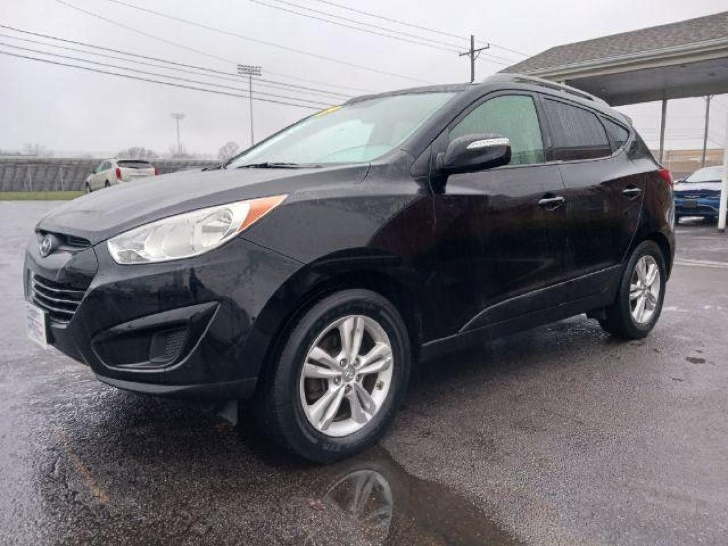 2012 Ash Black Mica Hyundai Tucson GLS AWD (KM8JUCAC9CU) with an 2.4L L4 DOHC 16V engine, 6-Speed Automatic transmission, located at 1230 East Main St, Xenia, OH, 45385, (937) 908-9800, 39.688026, -83.910172 - Photo#2