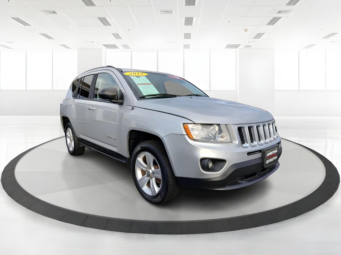 2012 Bright Silver Metallic Jeep Compass Sport 4WD (1C4NJDBB6CD) with an 2.4L L4 DOHC 16V engine, located at 401 Woodman Dr, Riverside, OH, 45431, (937) 908-9800, 39.760899, -84.123421 - Photo#0