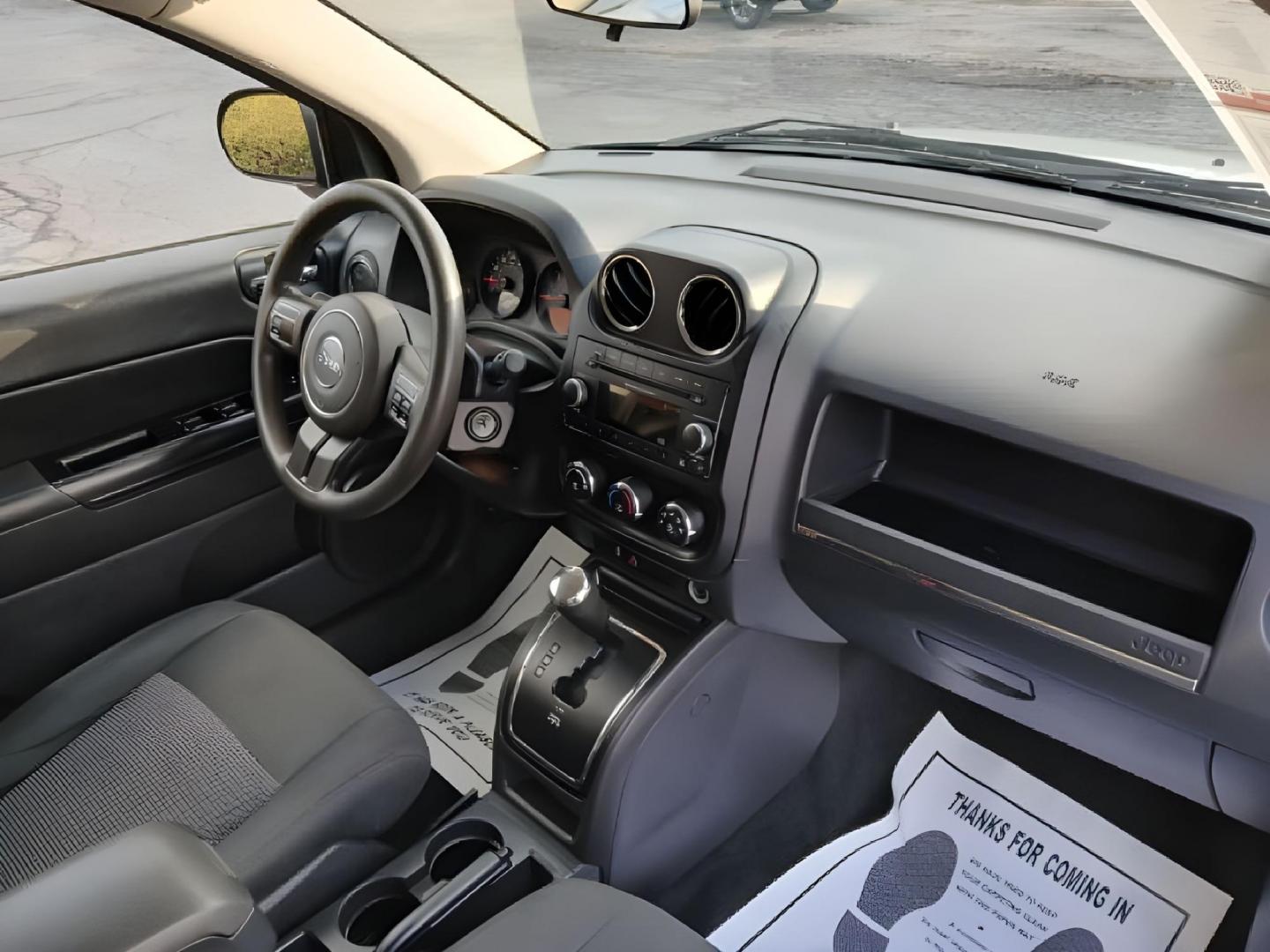 2012 Bright Silver Metallic Jeep Compass Sport 4WD (1C4NJDBB6CD) with an 2.4L L4 DOHC 16V engine, located at 401 Woodman Dr, Riverside, OH, 45431, (937) 908-9800, 39.760899, -84.123421 - Photo#8