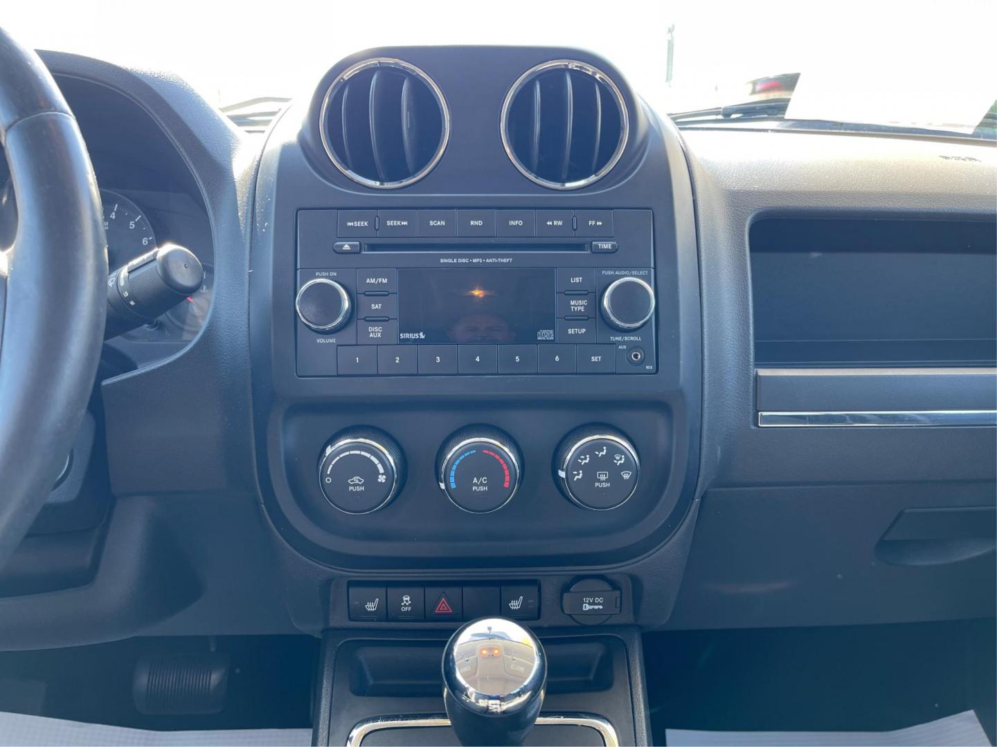 2012 Bright Silver Metallic Jeep Compass Latitude FWD (1C4NJCEB1CD) with an 2.4L L4 DOHC 16V engine, Continuously Variable Transmission transmission, located at 4508 South Dixie Dr, Moraine, OH, 45439, (937) 908-9800, 39.689976, -84.218452 - Photo#12