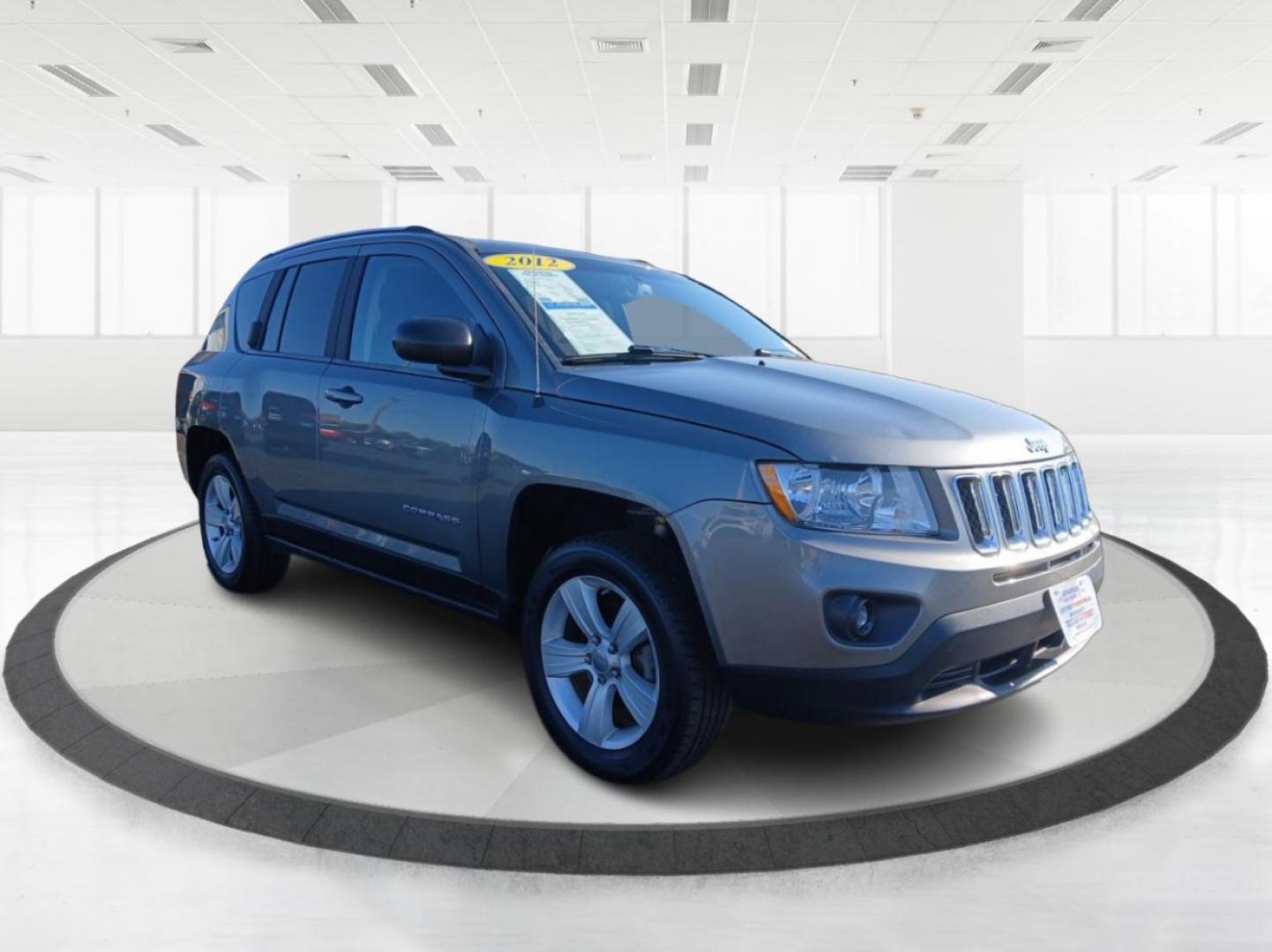 2012 Mineral Gray Metallic Jeep Compass Sport 4WD (1C4NJDBB6CD) with an 2.4L L4 DOHC 16V engine, located at 1951 S Dayton Lakeview Rd., New Carlisle, OH, 45344, (937) 908-9800, 39.890999, -84.050255 - Photo#0