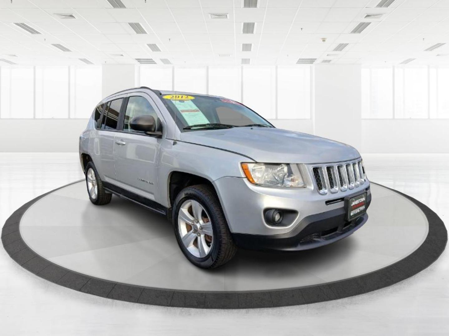 2012 Bright Silver Metallic Jeep Compass Sport 4WD (1C4NJDBB6CD) with an 2.4L L4 DOHC 16V engine, located at 1951 S Dayton Lakeview Rd., New Carlisle, OH, 45344, (937) 908-9800, 39.890999, -84.050255 - 2012 Jeep Compass Sport 4WD - Photo#0