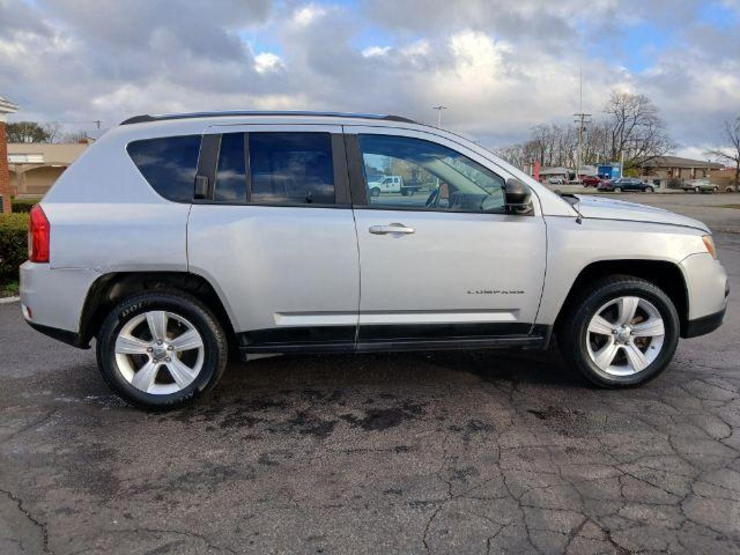 2012 Bright Silver Metallic Jeep Compass Sport 4WD (1C4NJDBB6CD) with an 2.4L L4 DOHC 16V engine, located at 1951 S Dayton Lakeview Rd., New Carlisle, OH, 45344, (937) 908-9800, 39.890999, -84.050255 - 2012 Jeep Compass Sport 4WD - Photo#16