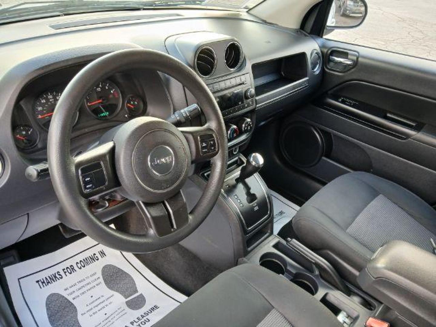 2012 Bright Silver Metallic Jeep Compass Sport 4WD (1C4NJDBB6CD) with an 2.4L L4 DOHC 16V engine, located at 1951 S Dayton Lakeview Rd., New Carlisle, OH, 45344, (937) 908-9800, 39.890999, -84.050255 - 2012 Jeep Compass Sport 4WD - Photo#19