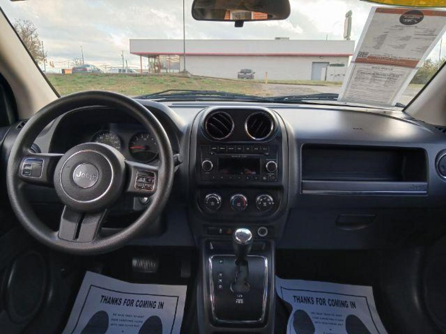 2012 Bright Silver Metallic Jeep Compass Sport 4WD (1C4NJDBB6CD) with an 2.4L L4 DOHC 16V engine, located at 1951 S Dayton Lakeview Rd., New Carlisle, OH, 45344, (937) 908-9800, 39.890999, -84.050255 - 2012 Jeep Compass Sport 4WD - Photo#20