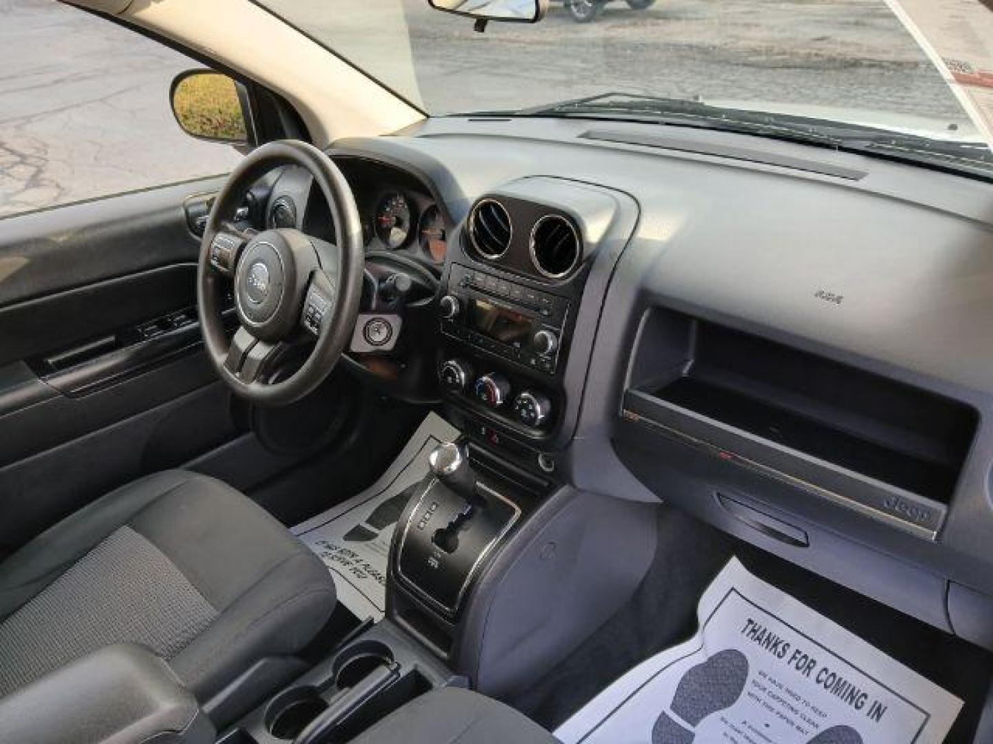 2012 Bright Silver Metallic Jeep Compass Sport 4WD (1C4NJDBB6CD) with an 2.4L L4 DOHC 16V engine, located at 1951 S Dayton Lakeview Rd., New Carlisle, OH, 45344, (937) 908-9800, 39.890999, -84.050255 - 2012 Jeep Compass Sport 4WD - Photo#21