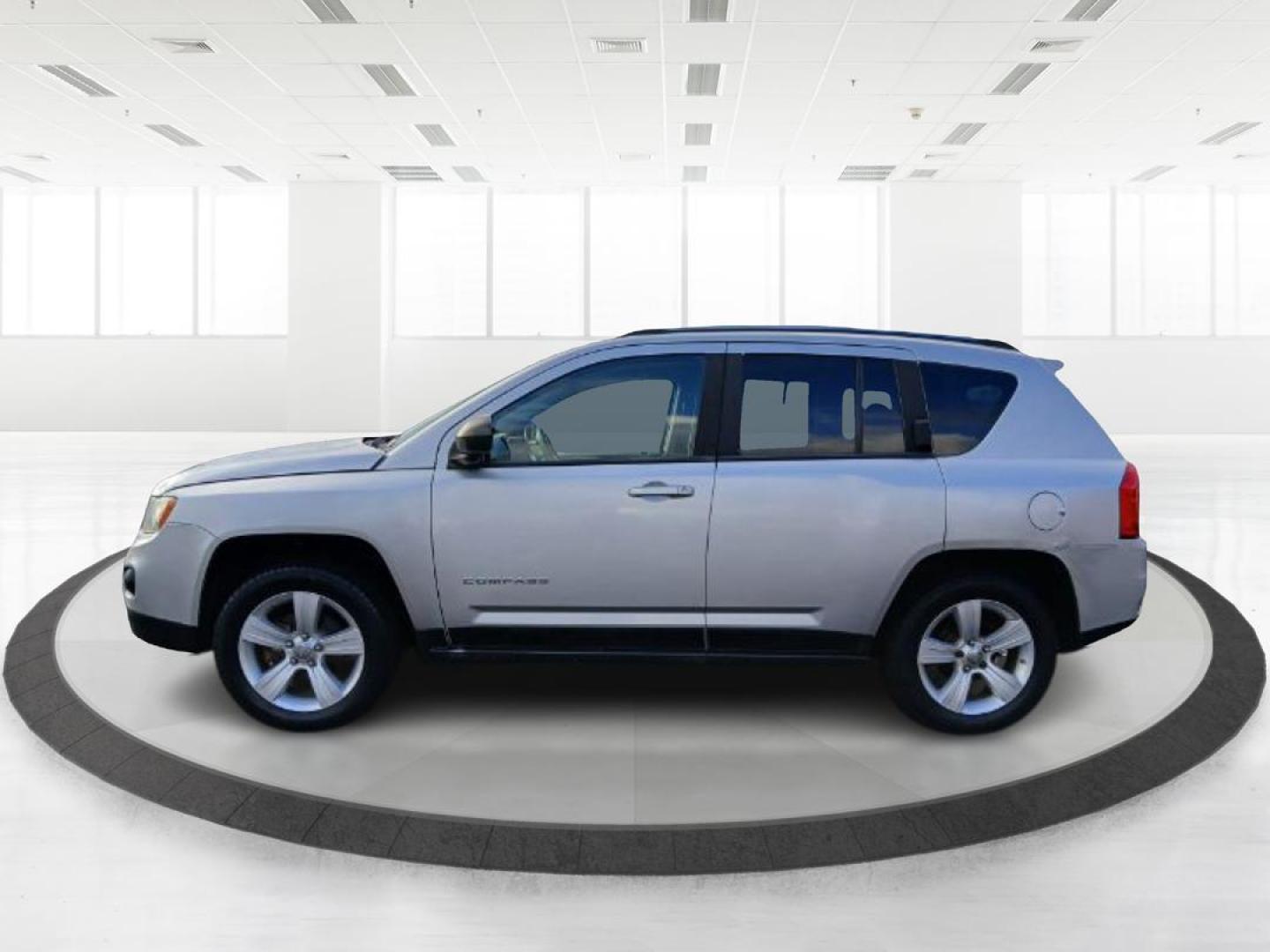 2012 Bright Silver Metallic Jeep Compass Sport 4WD (1C4NJDBB6CD) with an 2.4L L4 DOHC 16V engine, located at 1951 S Dayton Lakeview Rd., New Carlisle, OH, 45344, (937) 908-9800, 39.890999, -84.050255 - 2012 Jeep Compass Sport 4WD - Photo#3