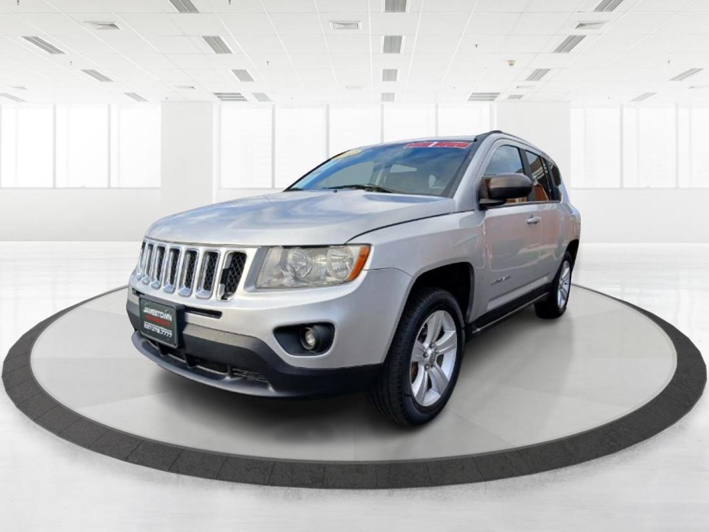 2012 Bright Silver Metallic Jeep Compass Sport 4WD (1C4NJDBB6CD) with an 2.4L L4 DOHC 16V engine, located at 1951 S Dayton Lakeview Rd., New Carlisle, OH, 45344, (937) 908-9800, 39.890999, -84.050255 - 2012 Jeep Compass Sport 4WD - Photo#5