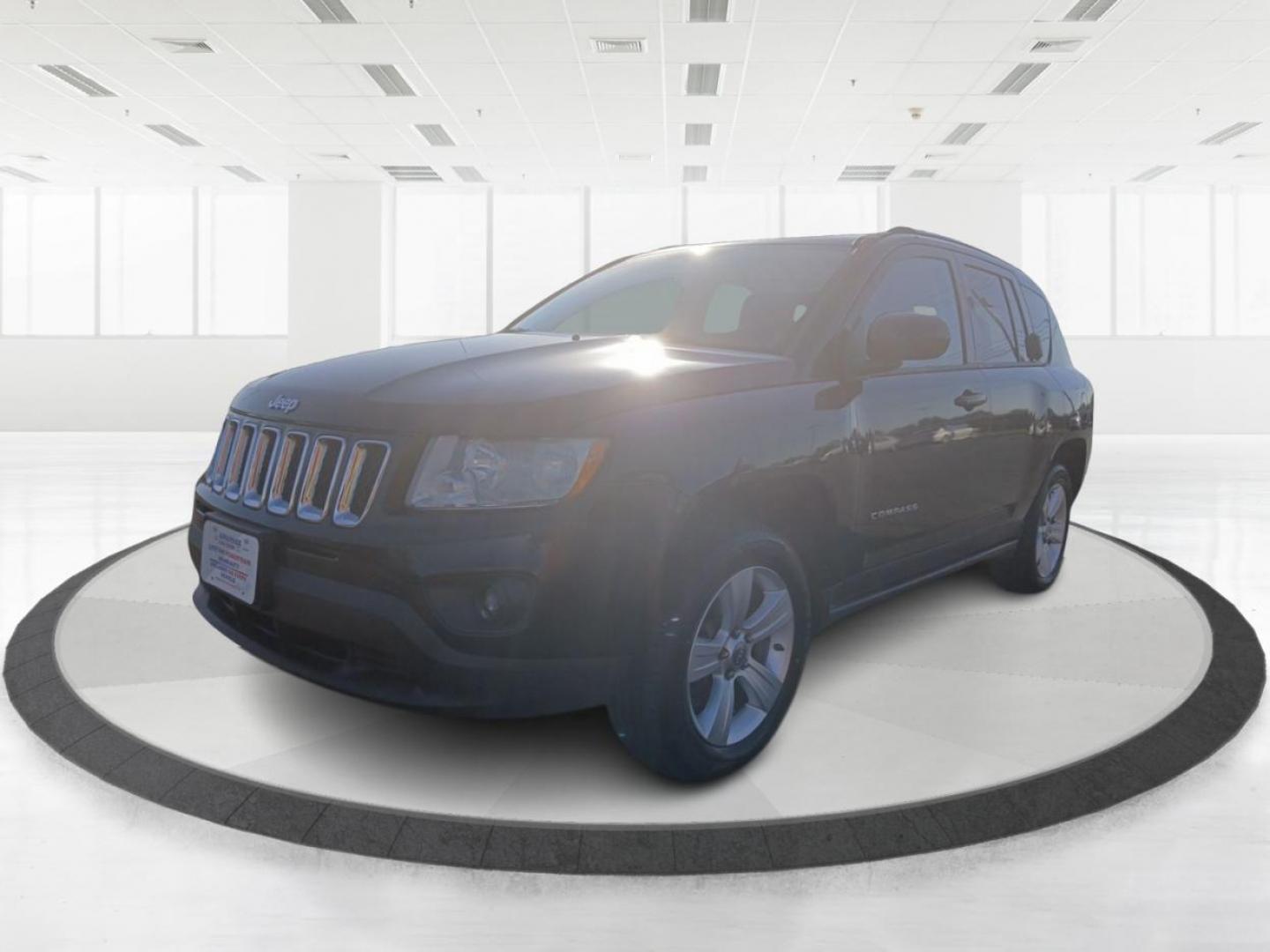 2012 Black Jeep Compass Latitude FWD (1C4NJCEB7CD) with an 2.4L L4 DOHC 16V engine, Continuously Variable Transmission transmission, located at 8750 N County Rd 25A, Piqua, OH, 45356, (937) 908-9800, 40.164391, -84.232513 - Photo#7