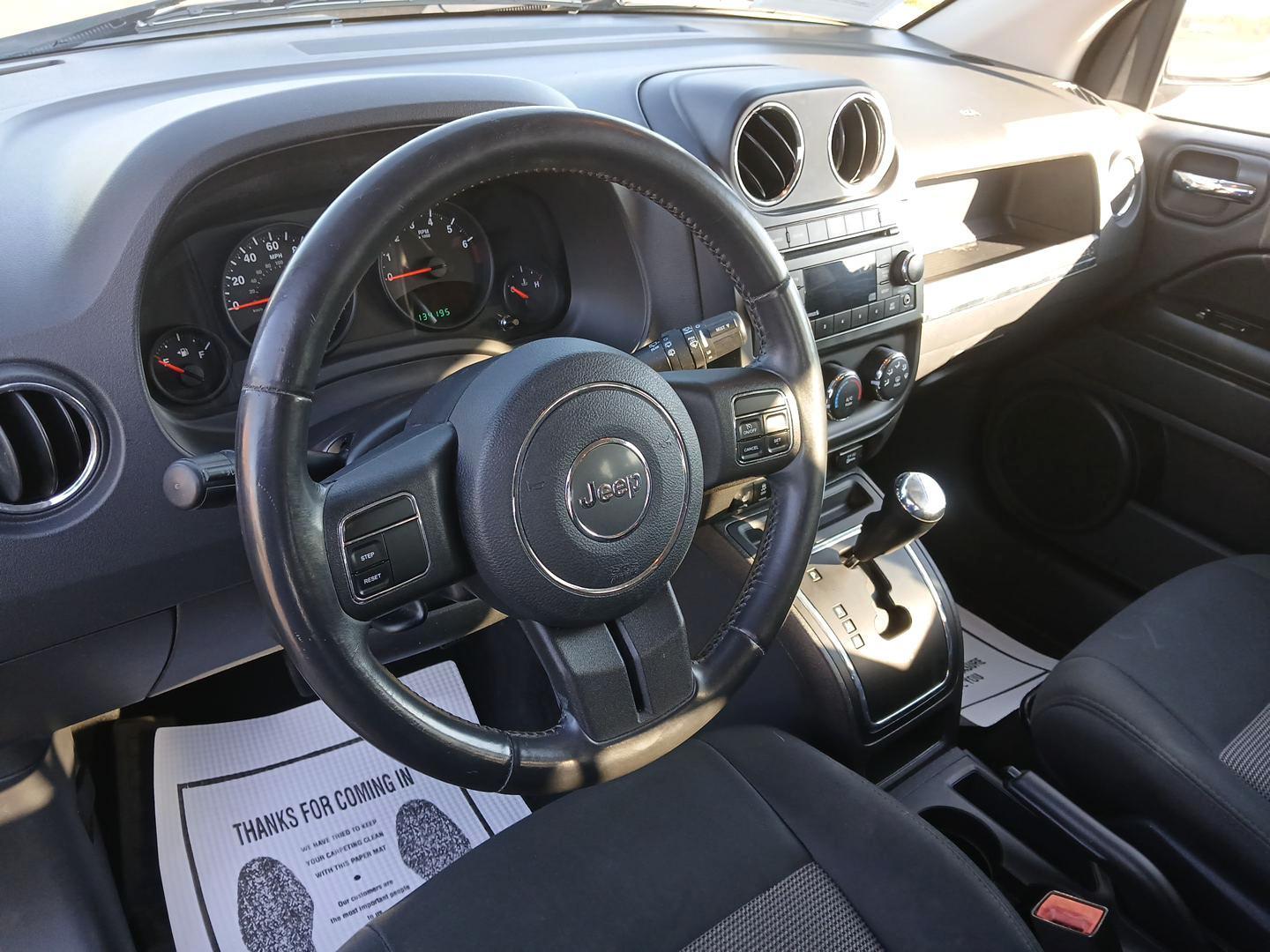 2012 Black Jeep Compass Latitude FWD (1C4NJCEB7CD) with an 2.4L L4 DOHC 16V engine, Continuously Variable Transmission transmission, located at 8750 N County Rd 25A, Piqua, OH, 45356, (937) 908-9800, 40.164391, -84.232513 - Photo#8