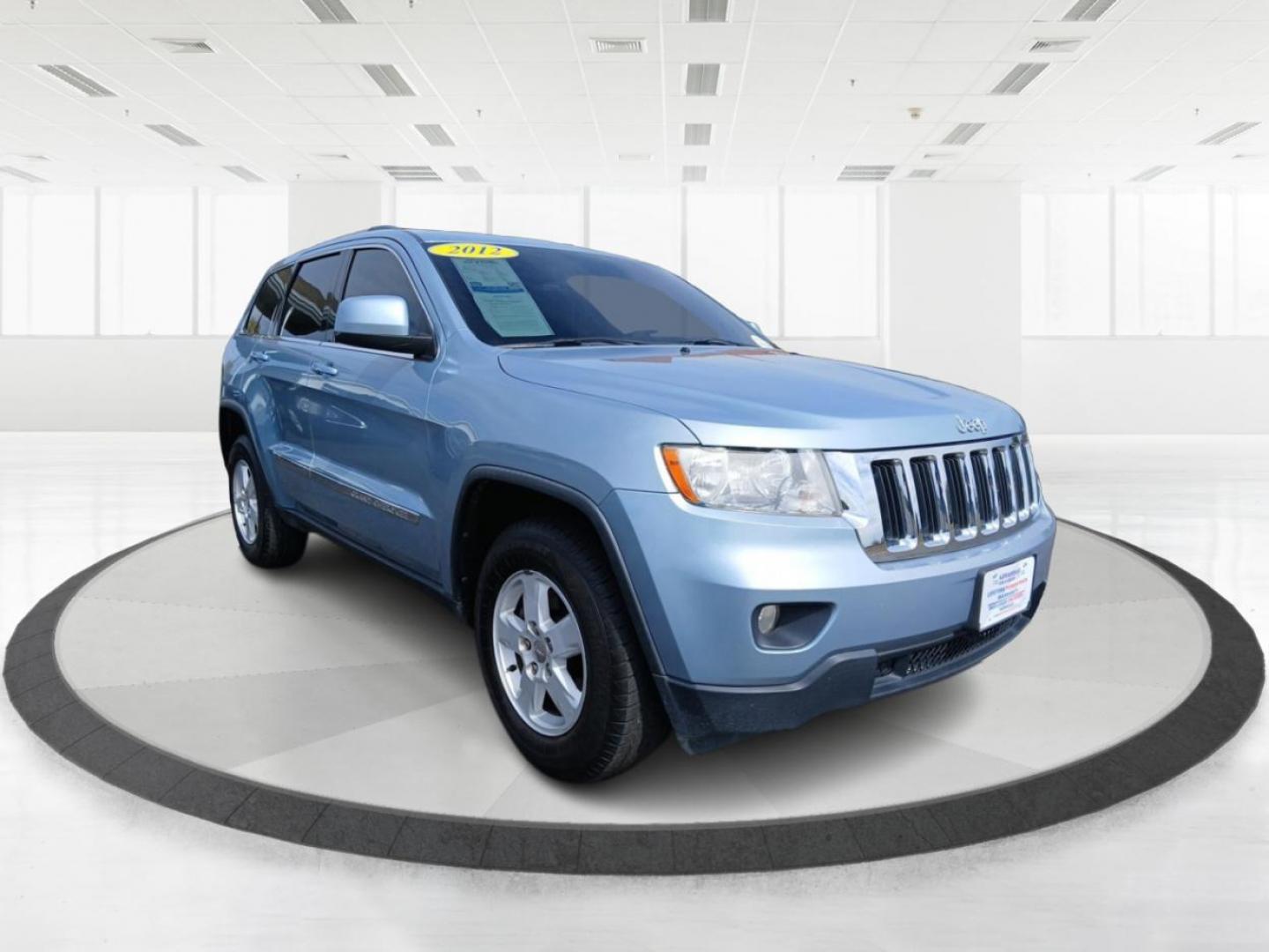 2012 True Blue Pearl Jeep Grand Cherokee Laredo 4WD (1C4RJFAG7CC) with an 3.6L V6 DOHC 24V engine, 5-Speed Automatic transmission, located at 401 Woodman Dr, Riverside, OH, 45431, (937) 908-9800, 39.760899, -84.123421 - Photo#0