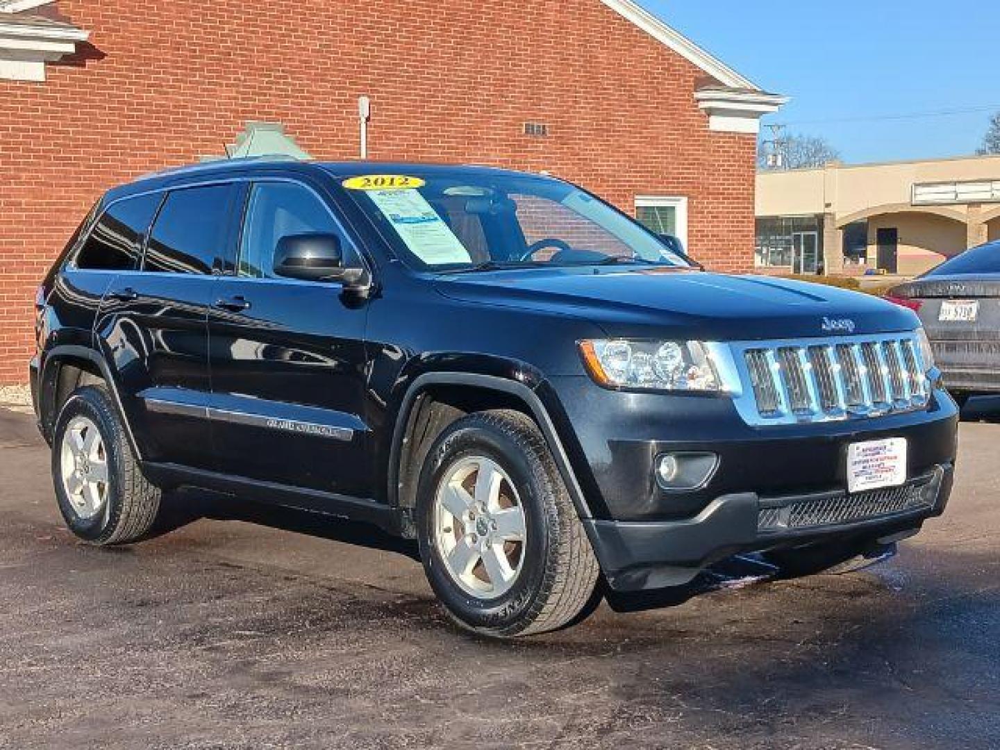 2012 Brilliant Black Crystal Pearl Jeep Grand Cherokee Laredo 4WD (1C4RJFAG1CC) with an 3.6L V6 DOHC 24V engine, 5-Speed Automatic transmission, located at 1099 N County Rd 25A , Troy, OH, 45373, (937) 908-9800, 40.057079, -84.212883 - Photo#0