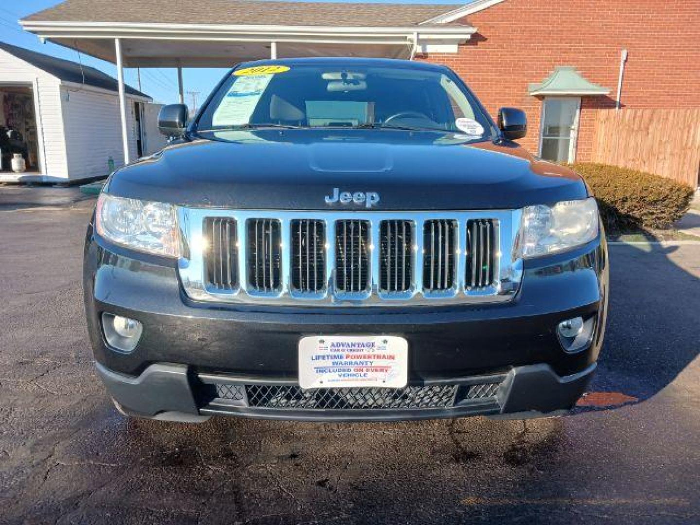 2012 Brilliant Black Crystal Pearl Jeep Grand Cherokee Laredo 4WD (1C4RJFAG1CC) with an 3.6L V6 DOHC 24V engine, 5-Speed Automatic transmission, located at 1099 N County Rd 25A , Troy, OH, 45373, (937) 908-9800, 40.057079, -84.212883 - Photo#1