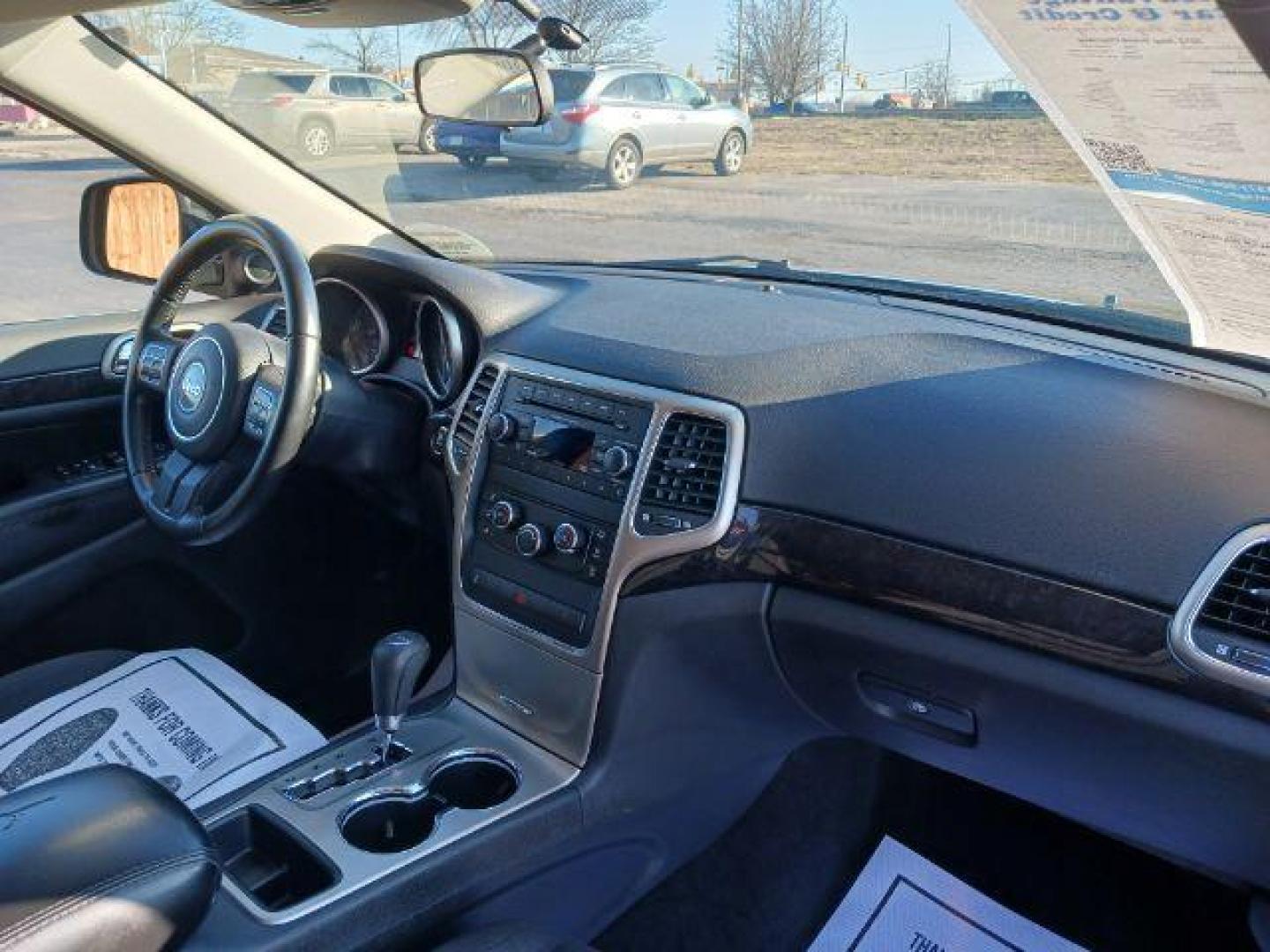 2012 Brilliant Black Crystal Pearl Jeep Grand Cherokee Laredo 4WD (1C4RJFAG1CC) with an 3.6L V6 DOHC 24V engine, 5-Speed Automatic transmission, located at 1099 N County Rd 25A , Troy, OH, 45373, (937) 908-9800, 40.057079, -84.212883 - Photo#8