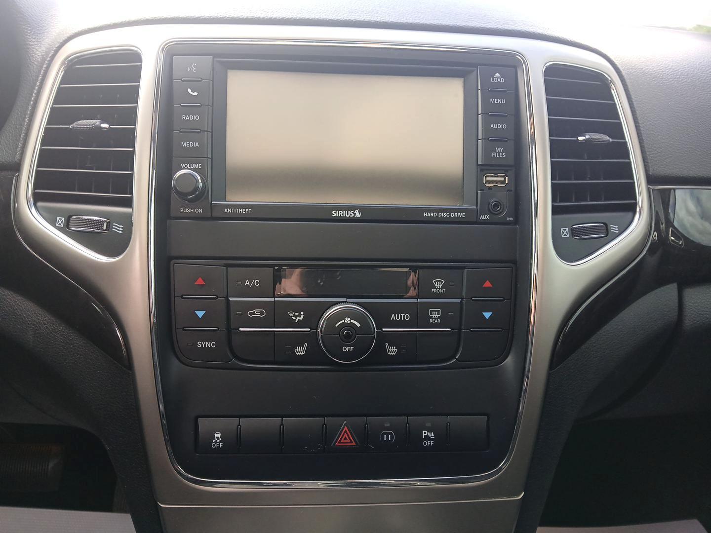 2012 Brilliant Black Crystal Pearl Jeep Grand Cherokee (1C4RJFAG1CC) with an 3.6L V6 DOHC 24V engine, 5-Speed Automatic transmission, located at 1230 East Main St, Xenia, OH, 45385, (937) 908-9800, 39.688026, -83.910172 - Photo#12