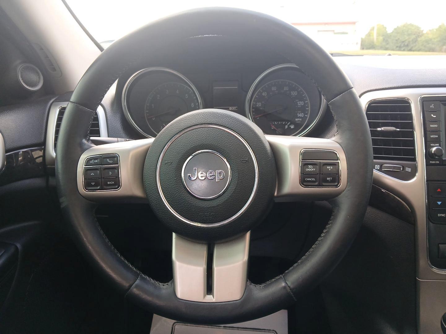 2012 Brilliant Black Crystal Pearl Jeep Grand Cherokee (1C4RJFAG1CC) with an 3.6L V6 DOHC 24V engine, 5-Speed Automatic transmission, located at 1230 East Main St, Xenia, OH, 45385, (937) 908-9800, 39.688026, -83.910172 - Photo#15