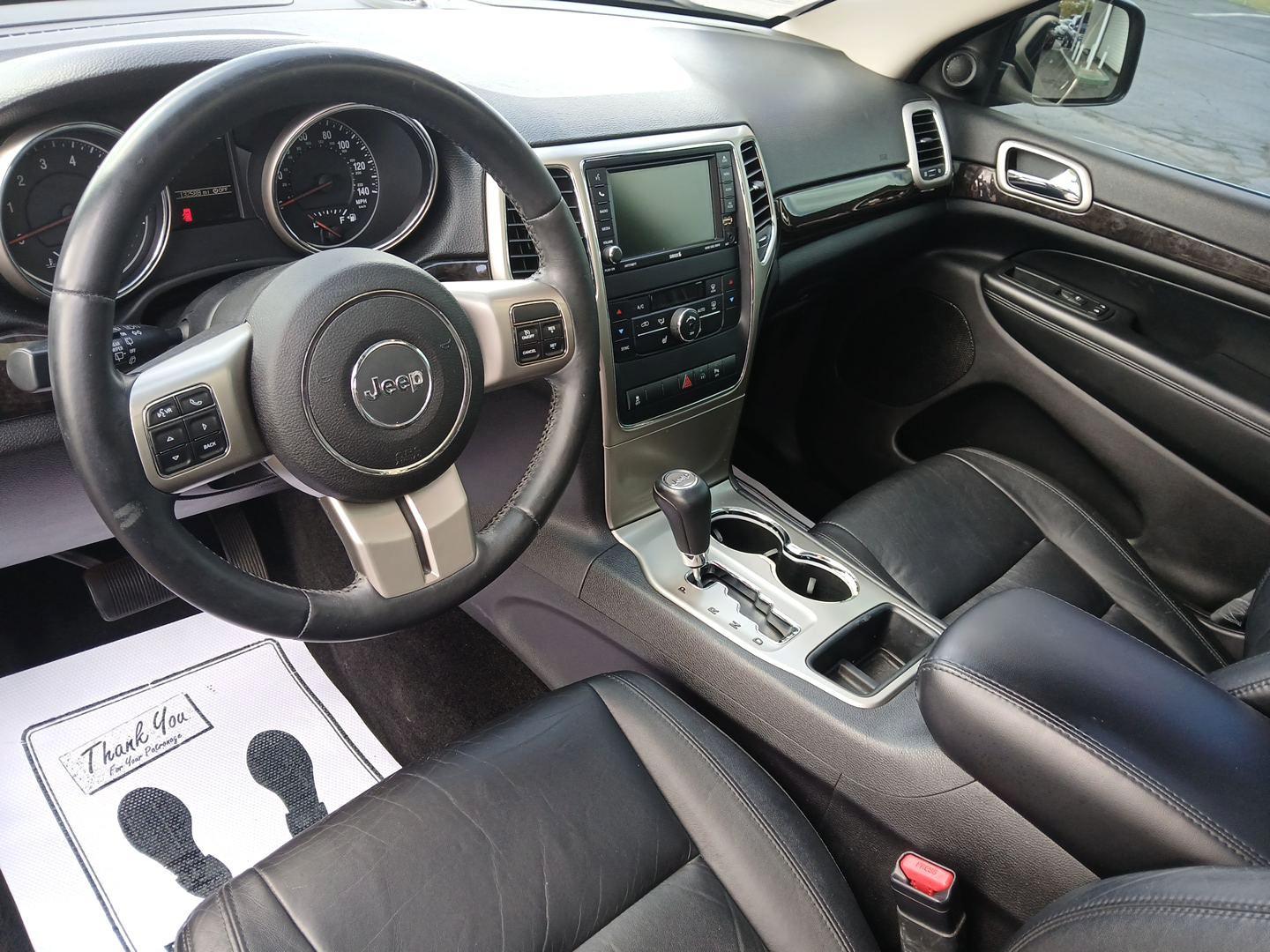 2012 Brilliant Black Crystal Pearl Jeep Grand Cherokee (1C4RJFAG1CC) with an 3.6L V6 DOHC 24V engine, 5-Speed Automatic transmission, located at 1230 East Main St, Xenia, OH, 45385, (937) 908-9800, 39.688026, -83.910172 - Photo#8