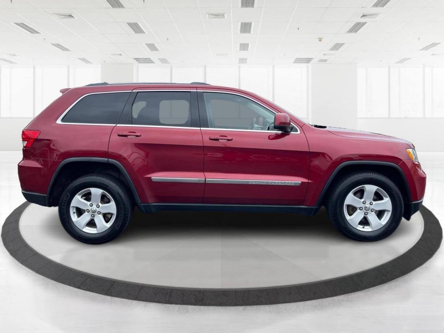 2012 Deep Cherry Red Crystal Pearl Jeep Grand Cherokee Laredo 4WD (1C4RJFAG6CC) with an 3.6L V6 DOHC 24V engine, 5-Speed Automatic transmission, located at 1230 East Main St, Xenia, OH, 45385, (937) 908-9800, 39.688026, -83.910172 - Photo#1