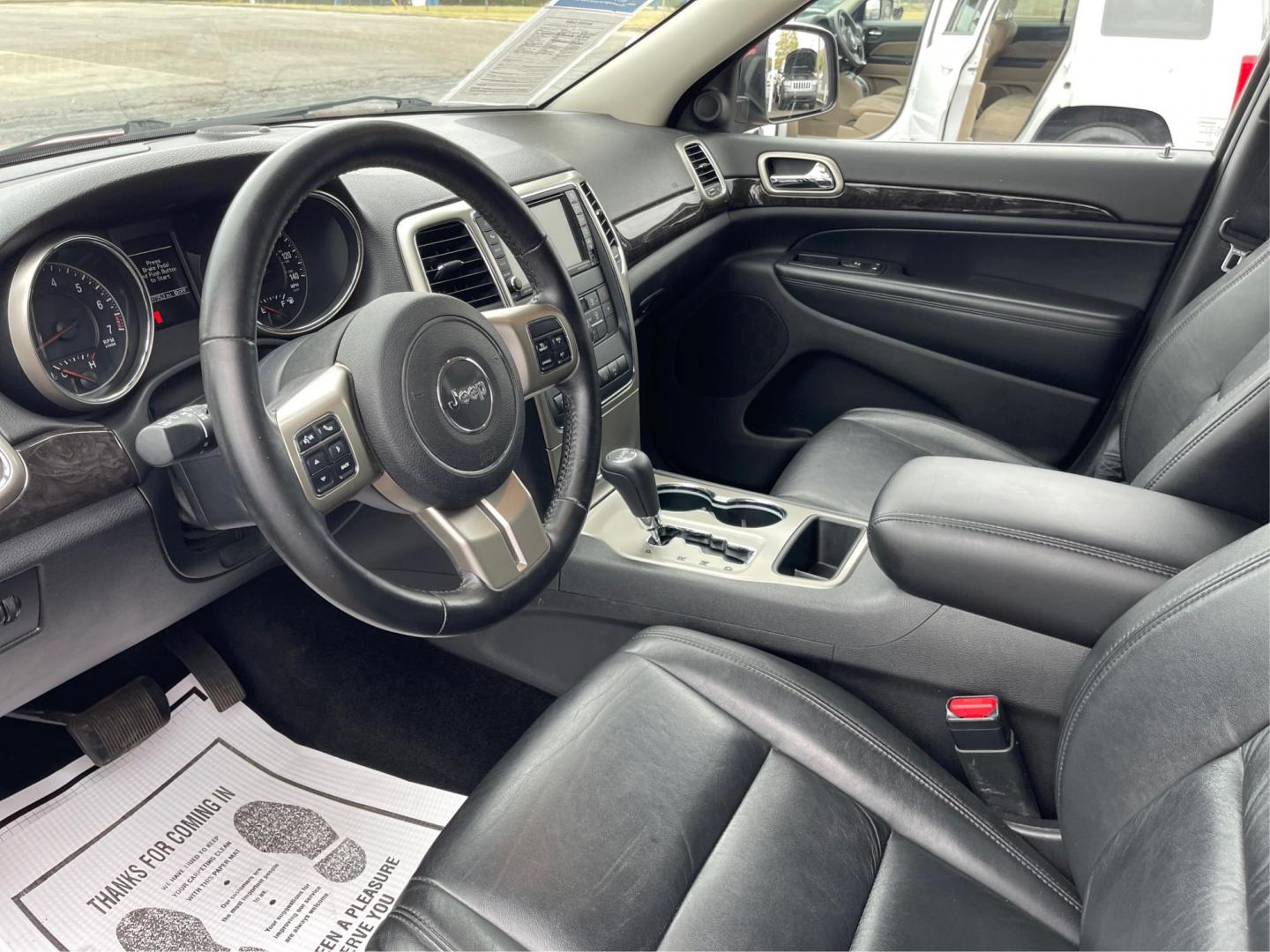 2012 Deep Cherry Red Crystal Pearl Jeep Grand Cherokee Laredo 4WD (1C4RJFAG6CC) with an 3.6L V6 DOHC 24V engine, 5-Speed Automatic transmission, located at 1230 East Main St, Xenia, OH, 45385, (937) 908-9800, 39.688026, -83.910172 - Photo#8