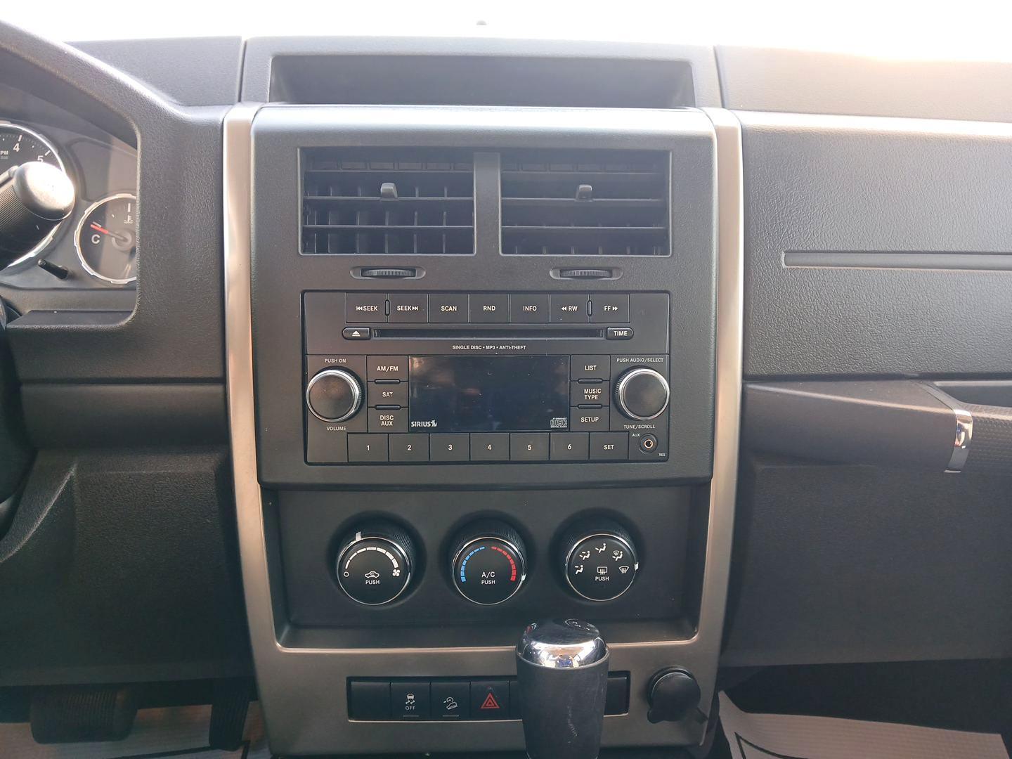 2012 Bright White Jeep Liberty Sport 4WD (1C4PJMAK6CW) with an 3.7L V6 SOHC 12V engine, 4-Speed Automatic transmission, located at 1184 Kauffman Ave, Fairborn, OH, 45324, (937) 908-9800, 39.807072, -84.030914 - Photo#11