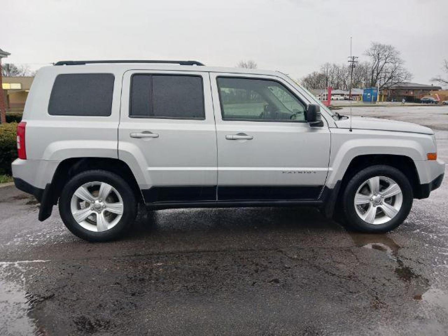 2012 Bright Silver Metallic Jeep Patriot Sport 2WD (1C4NJPBBXCD) with an 2.4L L4 DOHC 16V engine, located at 4508 South Dixie Dr, Moraine, OH, 45439, (937) 908-9800, 39.689976, -84.218452 - Photo#4