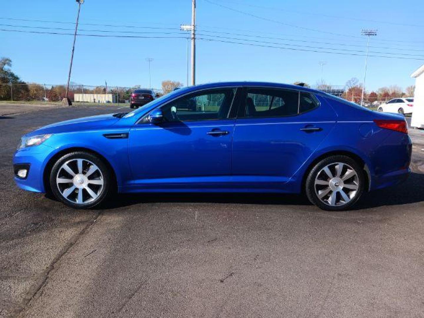 2012 Corsa Blue Pearl Metallic Kia Optima SX (5XXGR4A67CG) with an 2.0L L4 DOHC 16V TURBO engine, 6-Speed Automatic transmission, located at 1184 Kauffman Ave, Fairborn, OH, 45324, (937) 908-9800, 39.807072, -84.030914 - Photo#3