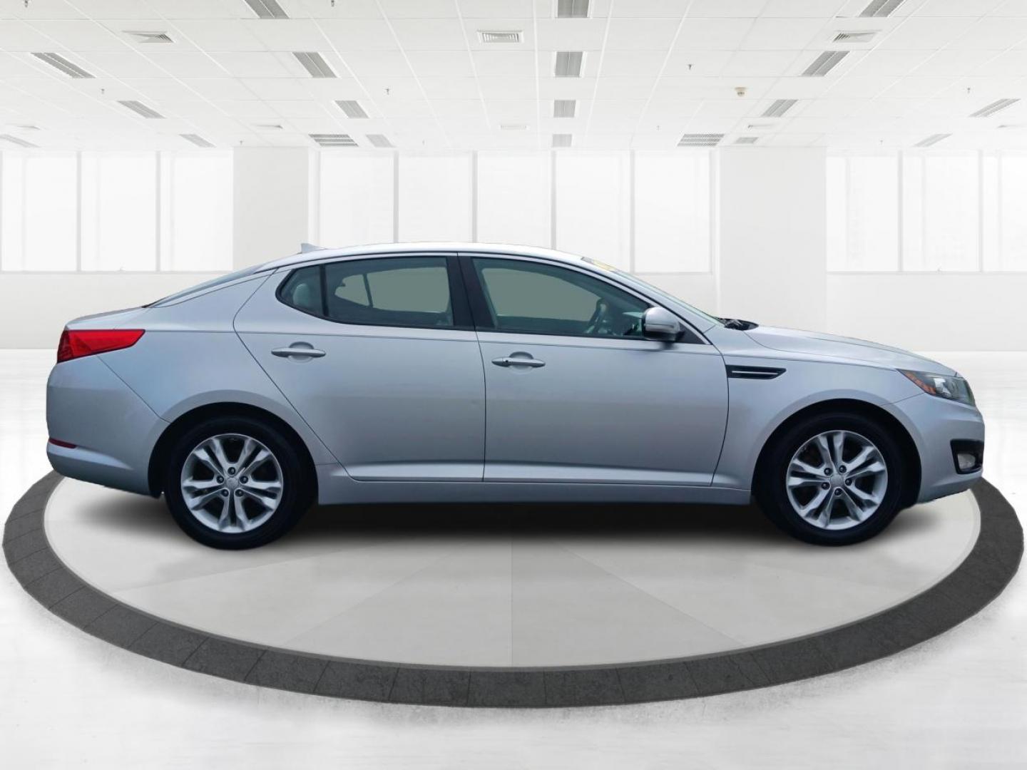 2012 Titanium Metallic Kia Optima EX (5XXGN4A7XCG) with an 2.4L L4 DOHC 16V engine, 6-Speed Automatic transmission, located at 4508 South Dixie Dr, Moraine, OH, 45439, (937) 908-9800, 39.689976, -84.218452 - Photo#1