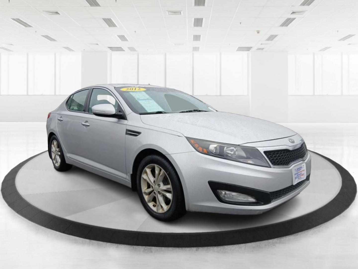 2012 Kia Optima EX (5XXGN4A7XCG) with an 2.4L L4 DOHC 16V engine, 6-Speed Automatic transmission, located at 401 Woodman Dr, Riverside, OH, 45431, (937) 908-9800, 39.760899, -84.123421 - 2012 Kia Optima EX - Photo#0