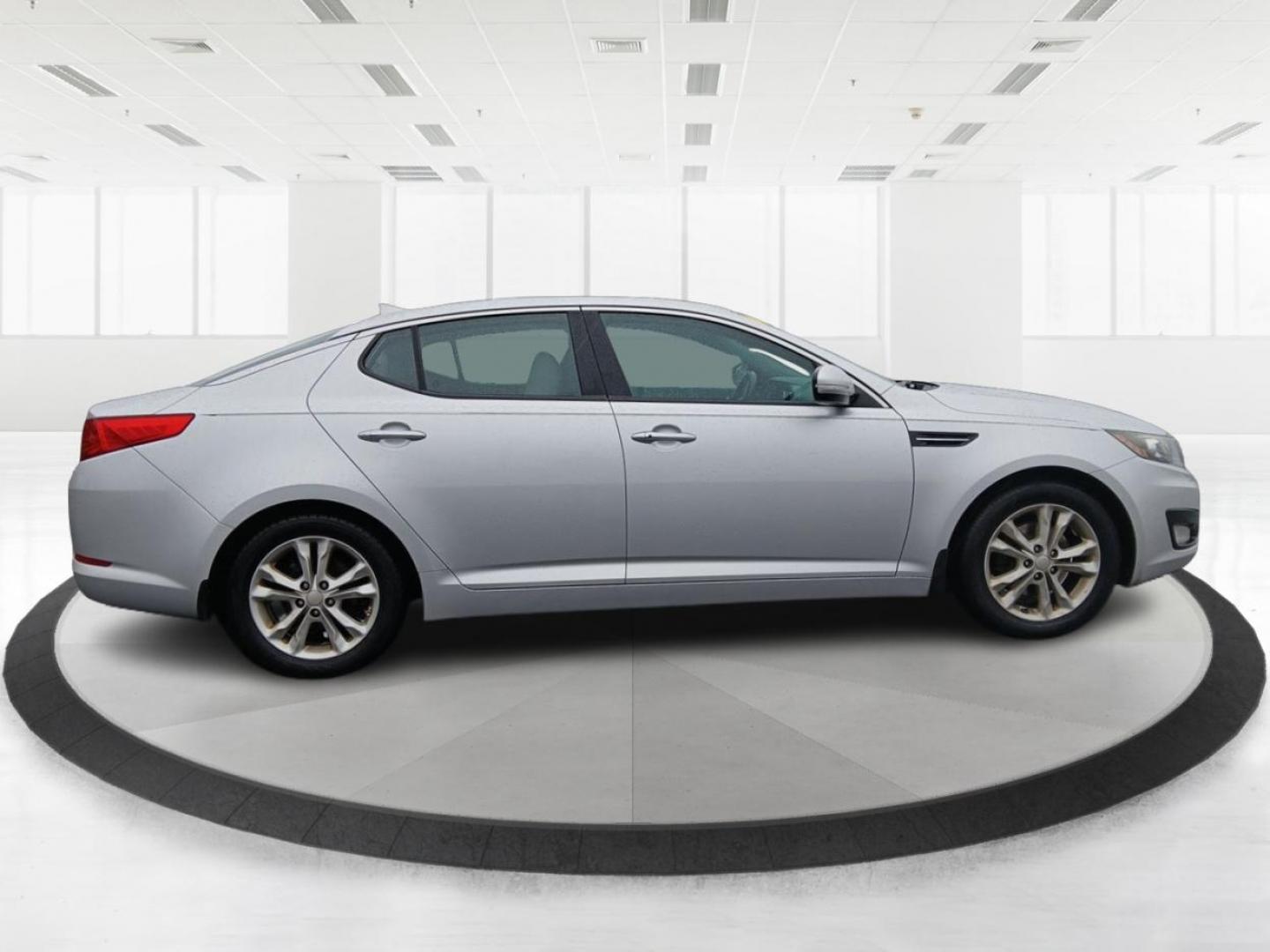 2012 Kia Optima EX (5XXGN4A7XCG) with an 2.4L L4 DOHC 16V engine, 6-Speed Automatic transmission, located at 401 Woodman Dr, Riverside, OH, 45431, (937) 908-9800, 39.760899, -84.123421 - 2012 Kia Optima EX - Photo#1