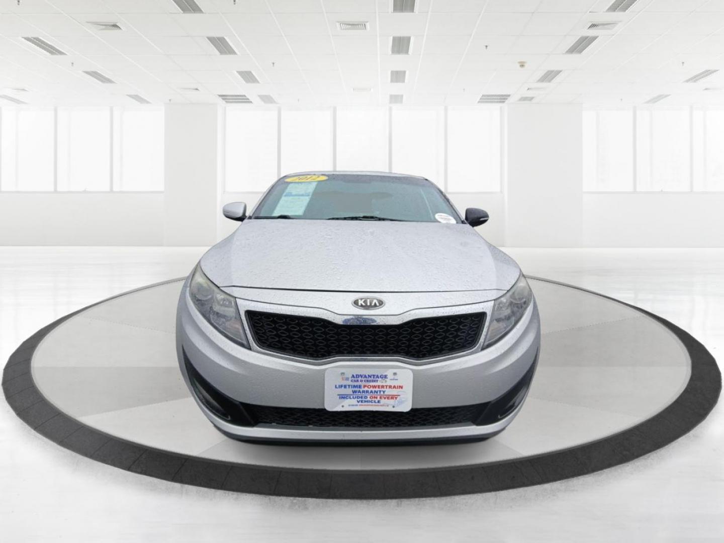 2012 Kia Optima EX (5XXGN4A7XCG) with an 2.4L L4 DOHC 16V engine, 6-Speed Automatic transmission, located at 401 Woodman Dr, Riverside, OH, 45431, (937) 908-9800, 39.760899, -84.123421 - 2012 Kia Optima EX - Photo#6