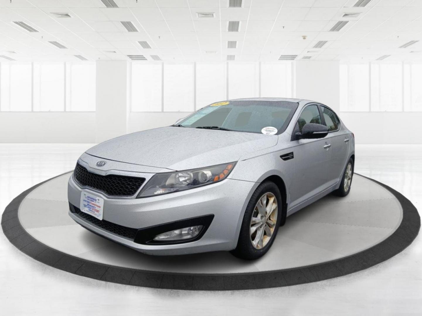 2012 Kia Optima EX (5XXGN4A7XCG) with an 2.4L L4 DOHC 16V engine, 6-Speed Automatic transmission, located at 401 Woodman Dr, Riverside, OH, 45431, (937) 908-9800, 39.760899, -84.123421 - 2012 Kia Optima EX - Photo#7