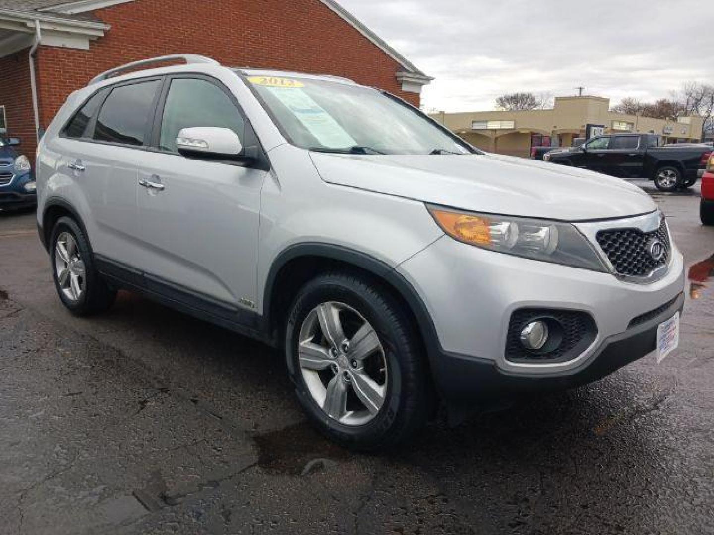 2012 Bright Silver Kia Sorento EX V6 4WD (5XYKUDA29CG) with an 3.5L V6 DOHC 24V engine, 6-Speed Automatic transmission, located at 880 E. National Road, Vandalia, OH, 45377, (937) 908-9800, 39.891918, -84.183594 - Photo#0