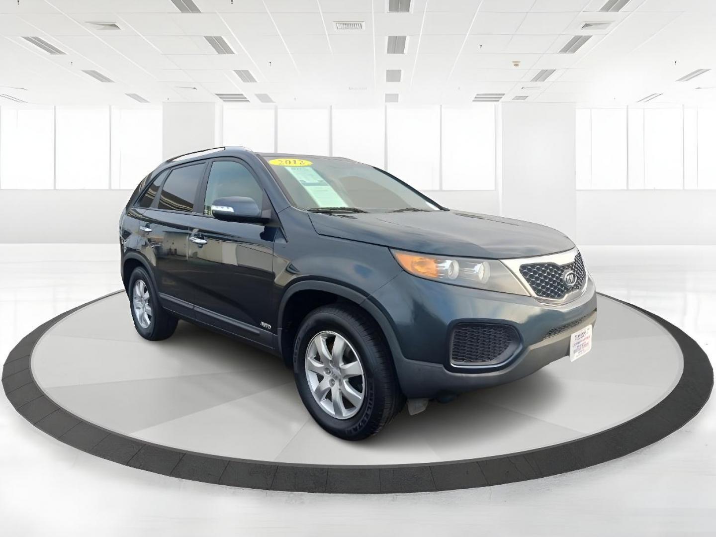 2012 Pacific Blue Kia Sorento (5XYKTDA2XCG) with an 3.5L V6 DOHC 24V engine, 6-Speed Automatic transmission, located at 1184 Kauffman Ave, Fairborn, OH, 45324, (937) 908-9800, 39.807072, -84.030914 - Photo#0