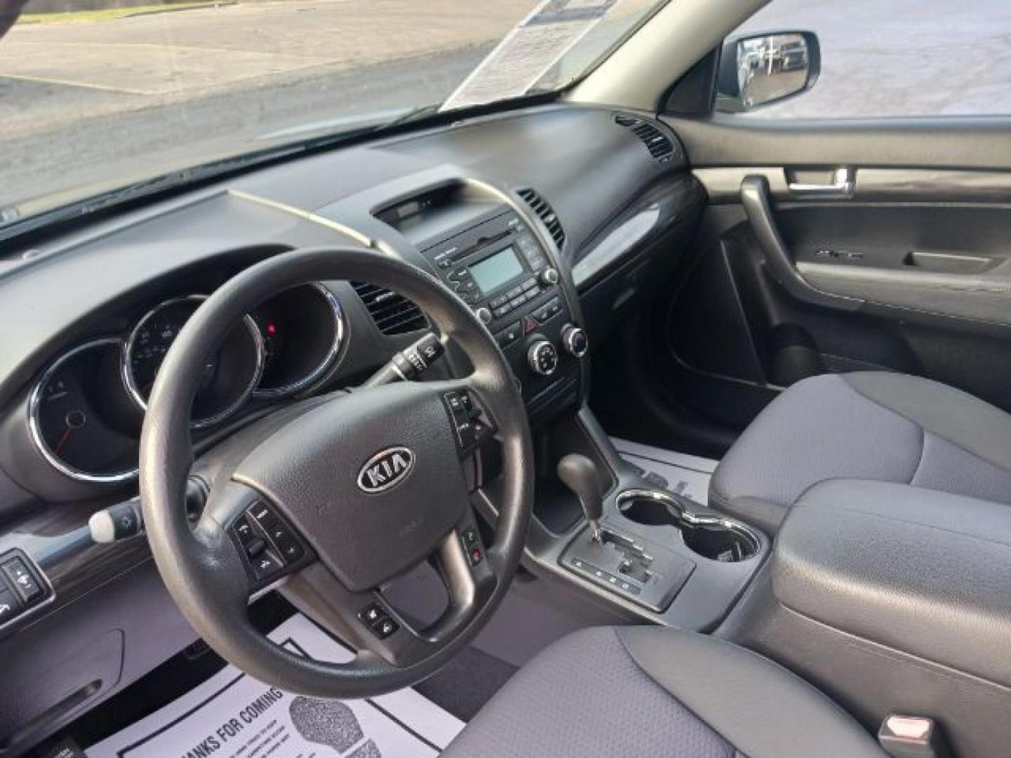 2012 Pacific Blue Kia Sorento (5XYKTDA2XCG) with an 3.5L V6 DOHC 24V engine, 6-Speed Automatic transmission, located at 1184 Kauffman Ave, Fairborn, OH, 45324, (937) 908-9800, 39.807072, -84.030914 - Photo#14