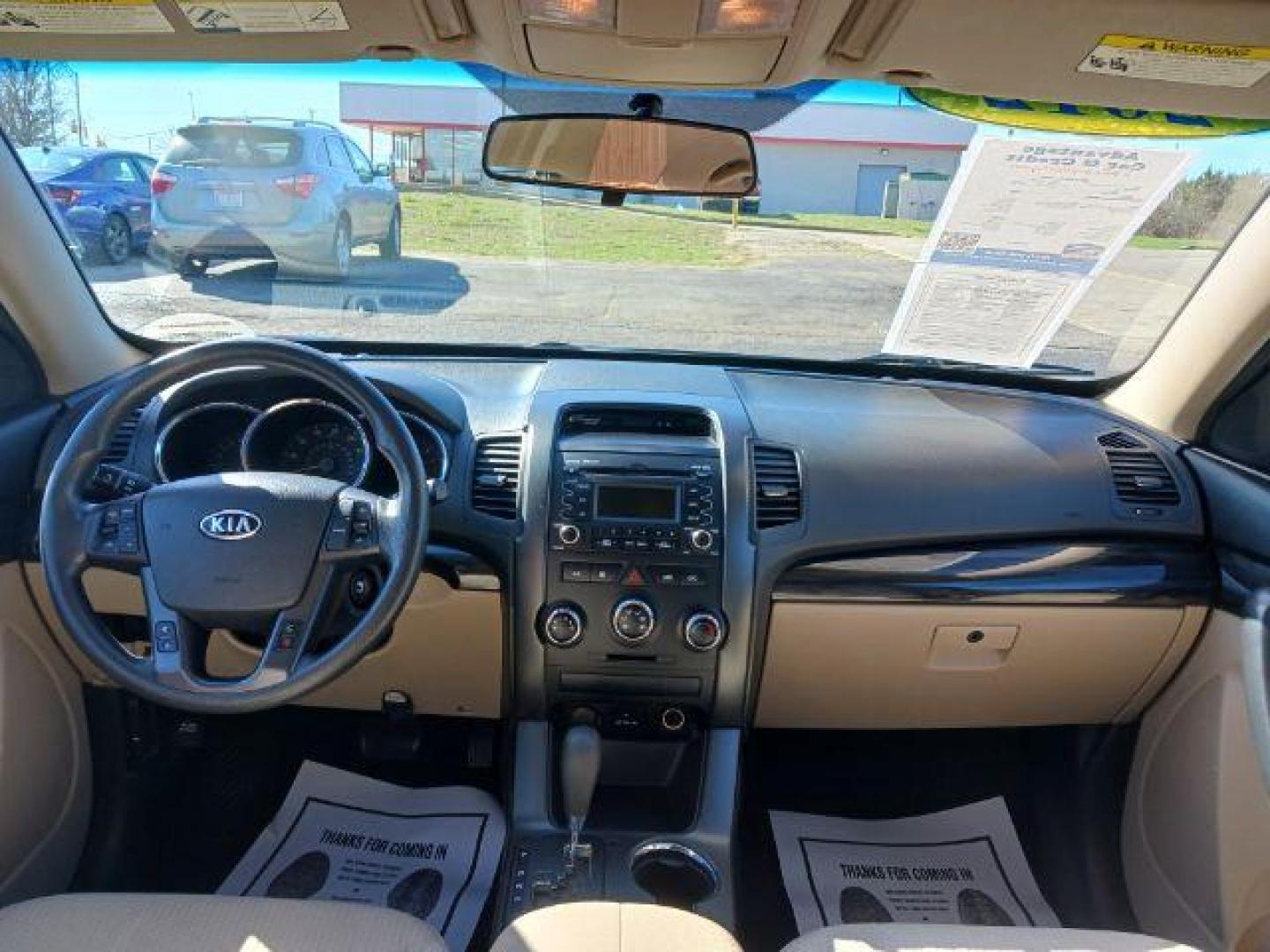 2012 Baltic Blue Kia Sorento LX 2WD (5XYKT3A15CG) with an 2.4L L4 DOHC 16V engine, 6-Speed Automatic transmission, located at 880 E. National Road, Vandalia, OH, 45377, (937) 908-9800, 39.891918, -84.183594 - Photo#7