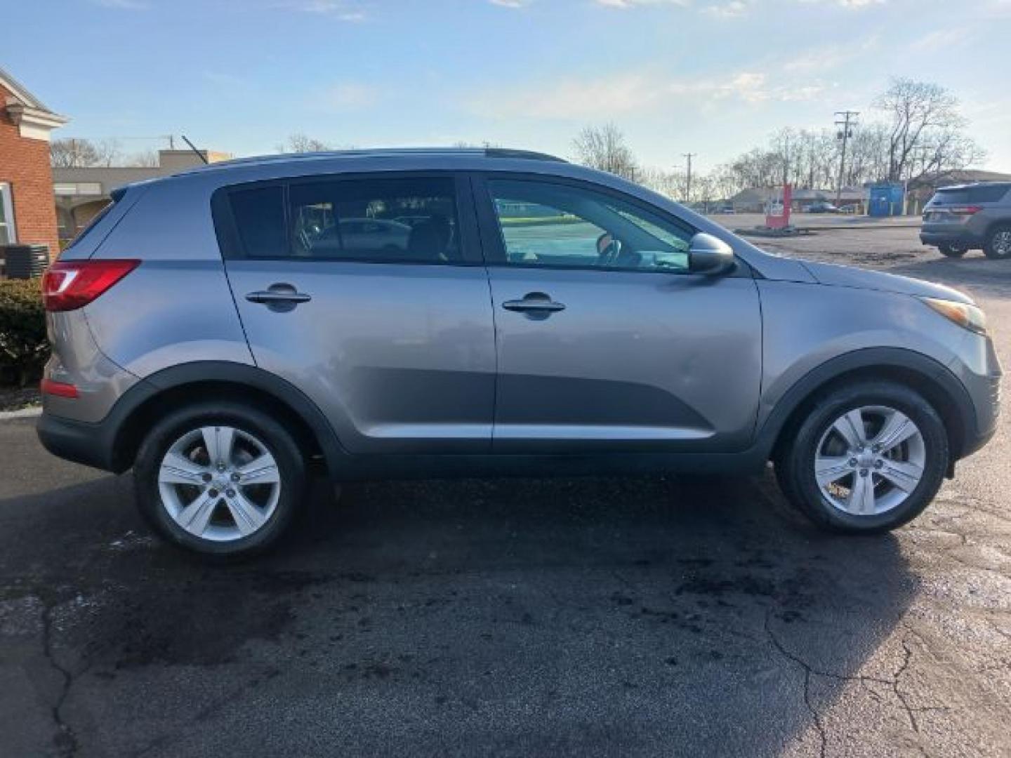 2012 Bright Silver Kia Sportage (KNDPB3A25C7) with an 2.4L V6 DOHC 24V engine, 6-Speed Automatic transmission, located at 4508 South Dixie Dr, Moraine, OH, 45439, (937) 908-9800, 39.689976, -84.218452 - Photo#13