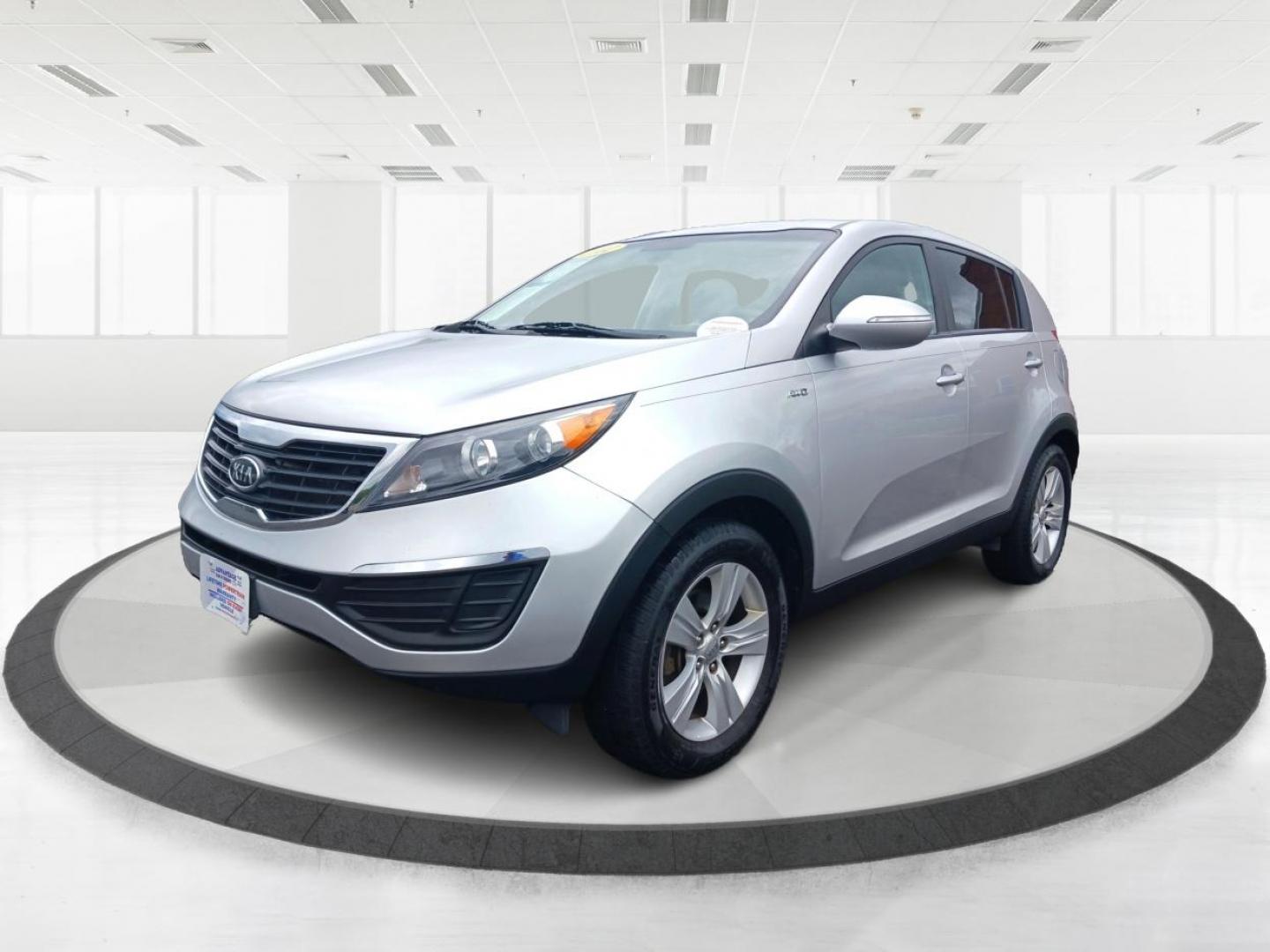 2012 Bright Silver Kia Sportage (KNDPBCA29C7) with an 2.4L V6 DOHC 24V engine, 6-Speed Automatic transmission, located at 1099 N County Rd 25A , Troy, OH, 45373, (937) 908-9800, 40.057079, -84.212883 - Photo#7